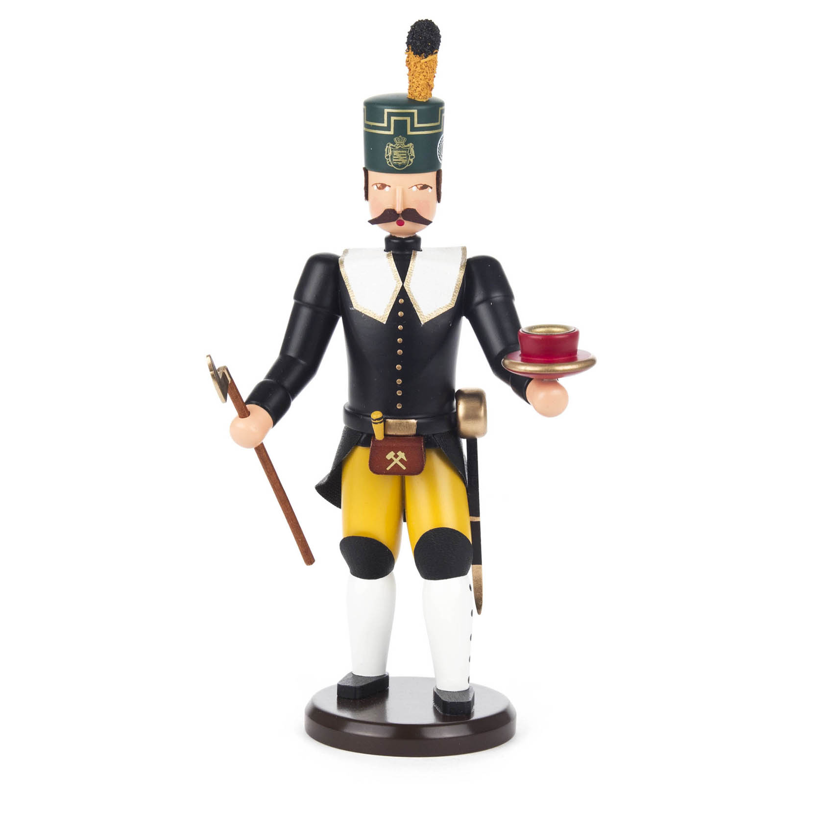 Holzfigur eines Bergmanns in traditioneller Bergmannskleidung mit schwarzen Stiefeln, gelber Hose, schwarzem Mantel und schwarzem Hut, hält einen Kerzenhalter.