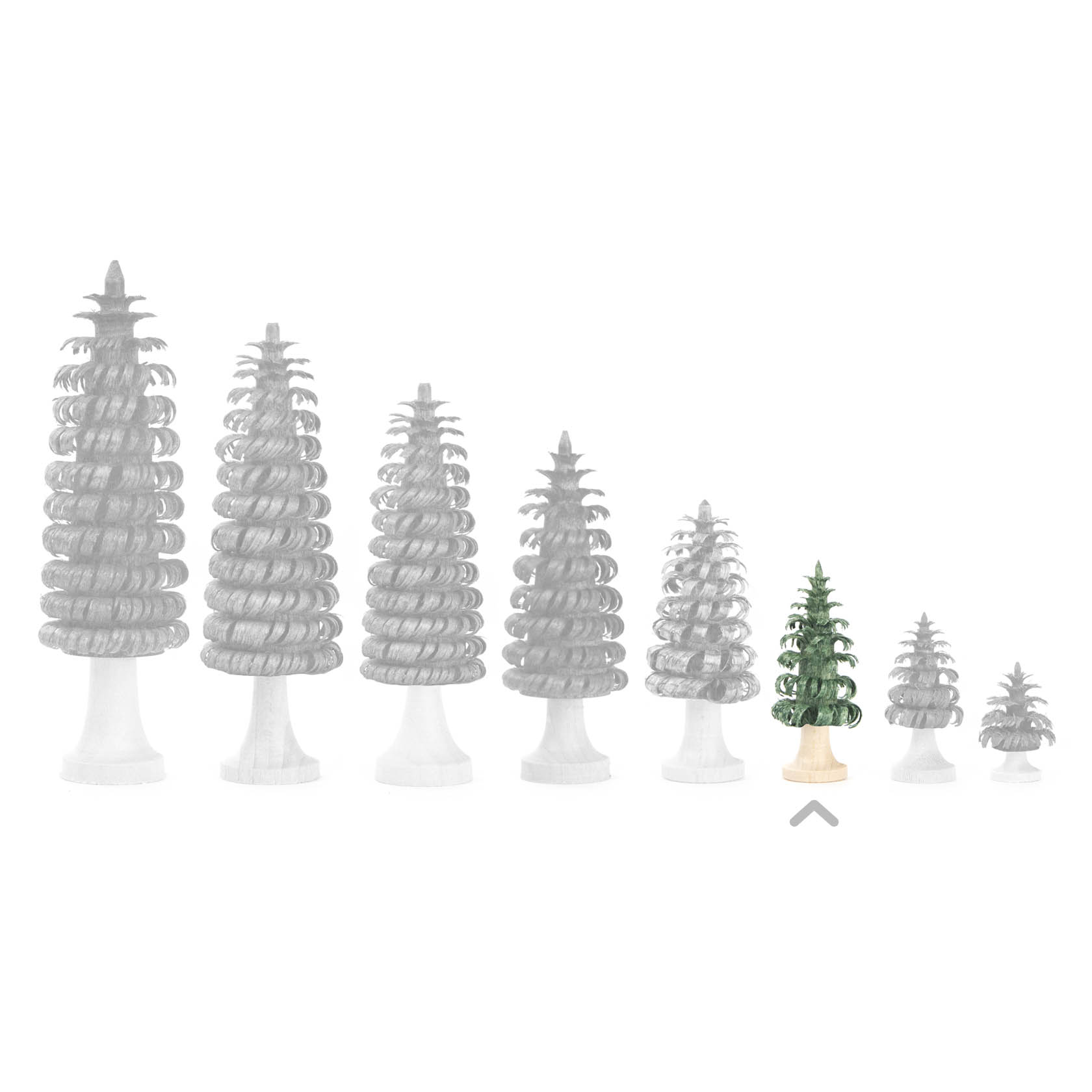 Ein kleiner grüner Ringelbaum mit Stamm, 4 cm hoch, umgeben von größeren, ausgegrauten Ringelbäumen.
