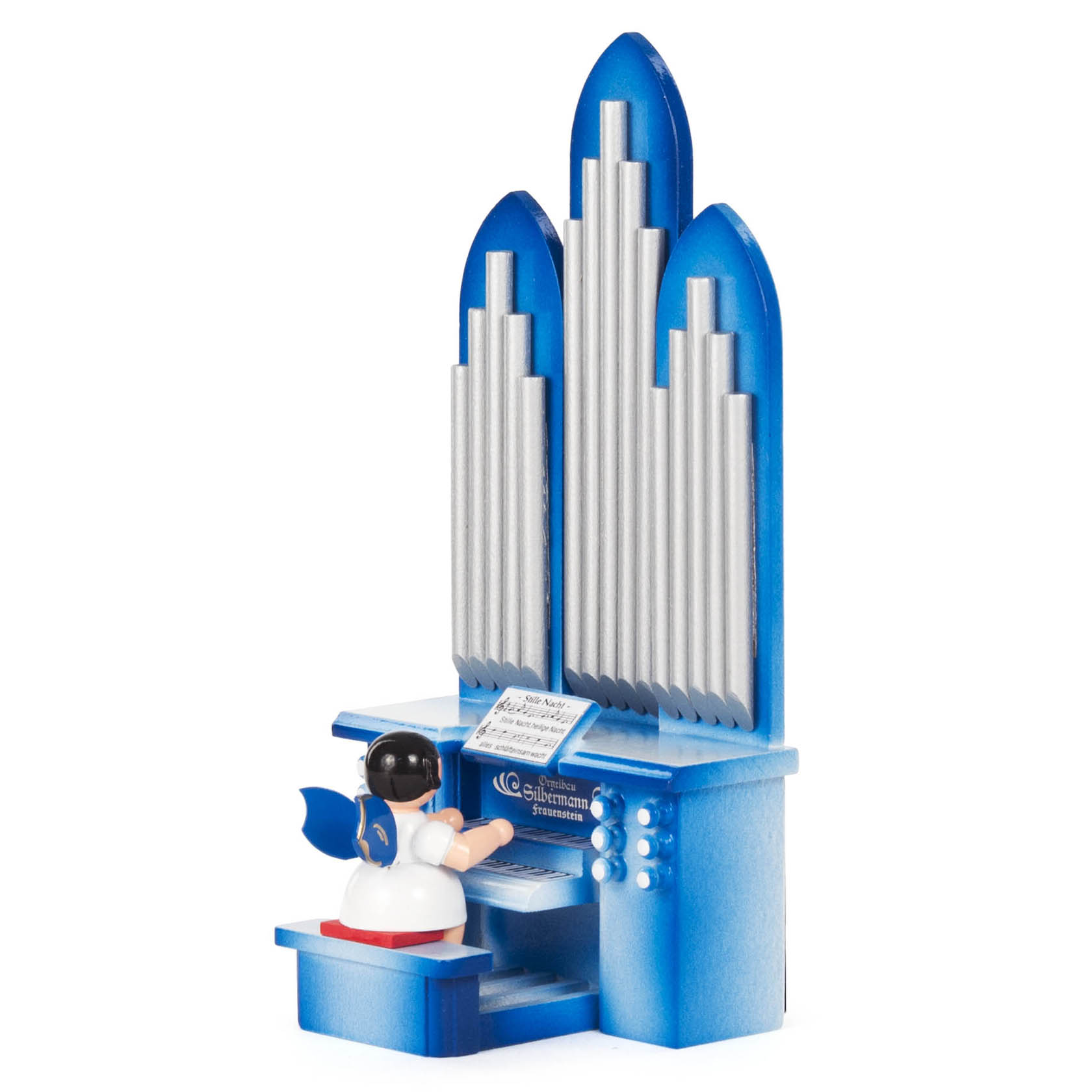 Holzengel mit blauen Flügeln spielt auf einer blauen Orgel mit silbernen Pfeifen. Der Engel sitzt auf einer Bank und betrachtet ein Notenblatt.
