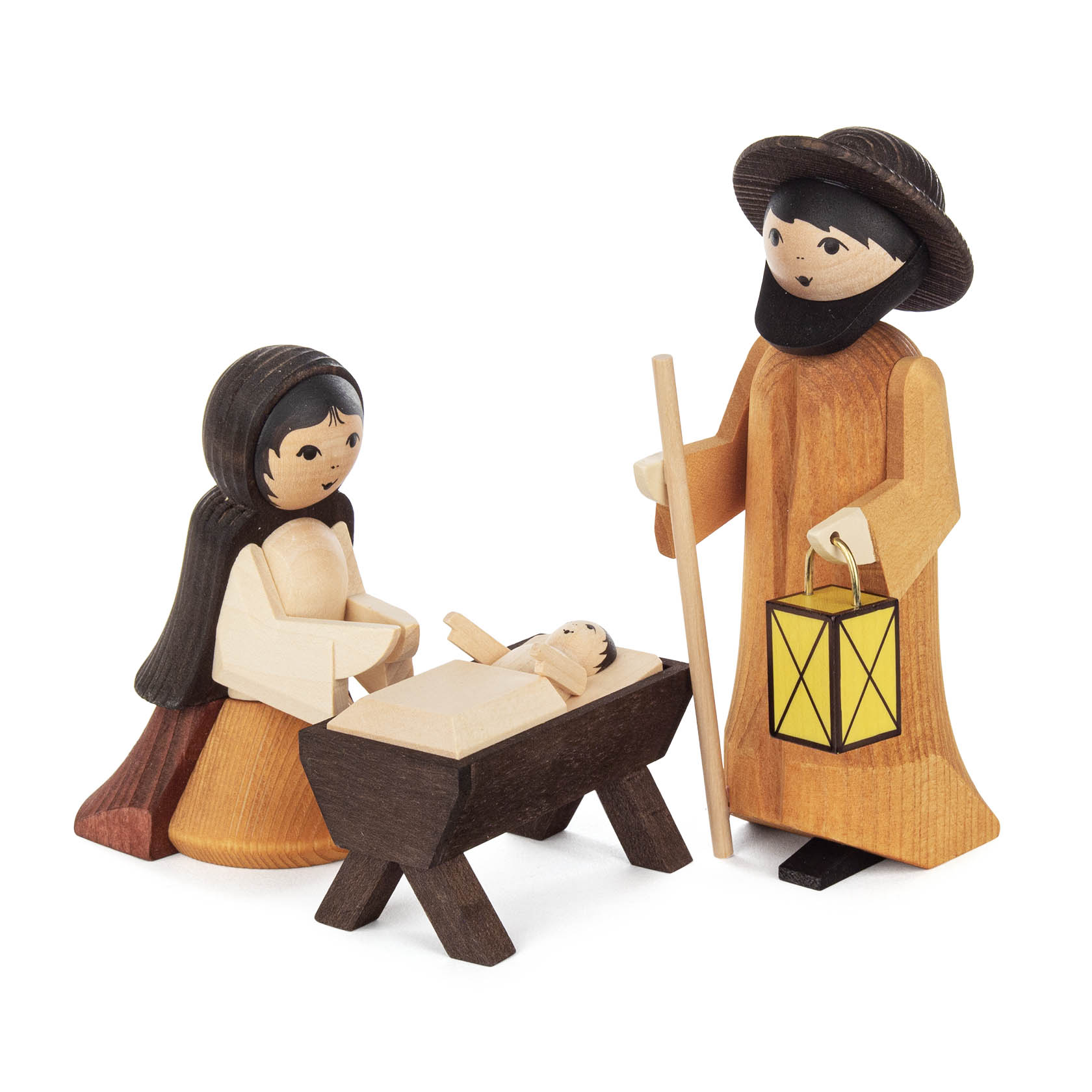 Holzfiguren der Heiligen Familie: Maria kniet, Josef steht mit einer Laterne, und das Jesuskind liegt in einer Krippe. im Dregeno Online Shop günstig kaufen