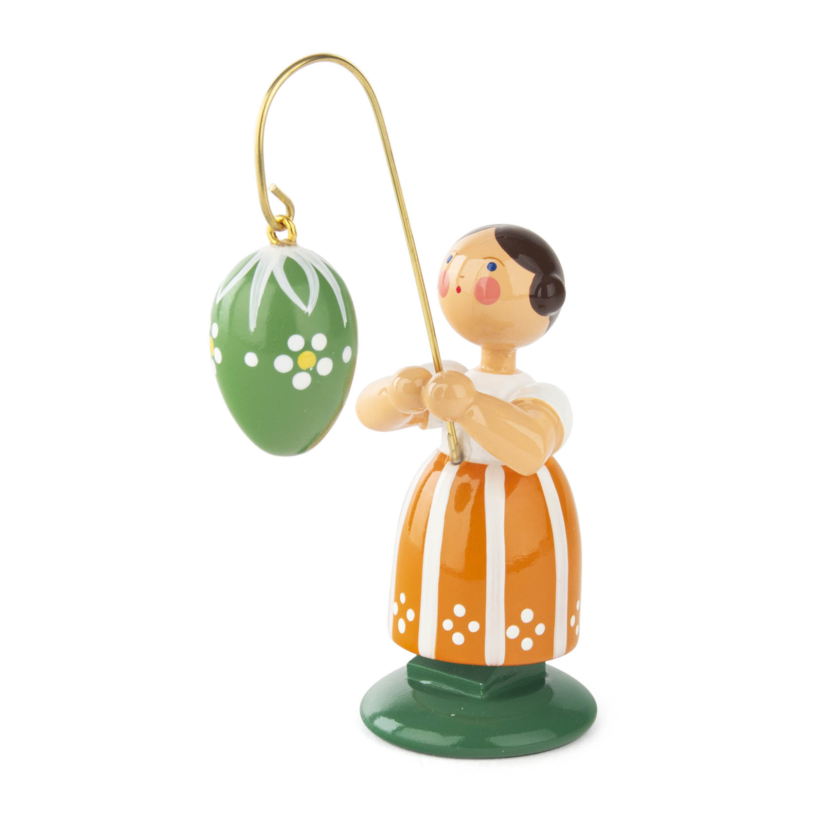 Holzfigur eines Mädchens in gelbem Rock mit weißem Hemd, hält ein grünes Osterei mit Blumenmuster an einem goldenen Stab. im Dregeno Online Shop günstig kaufen