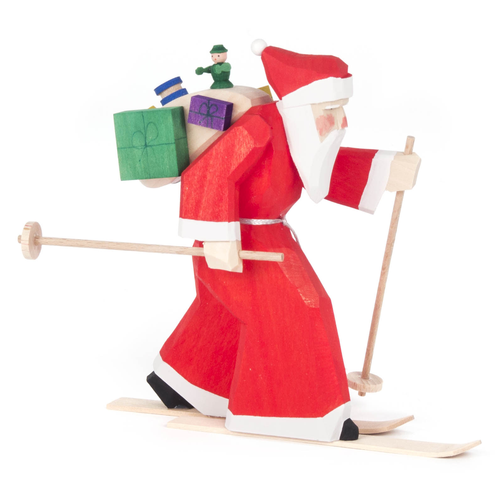 Holzfigur von Ruprecht in rotem Gewand auf Skiern, mit Geschenken und Puppe auf dem Rücken, geschnitzt. im Dregeno Online Shop günstig kaufen