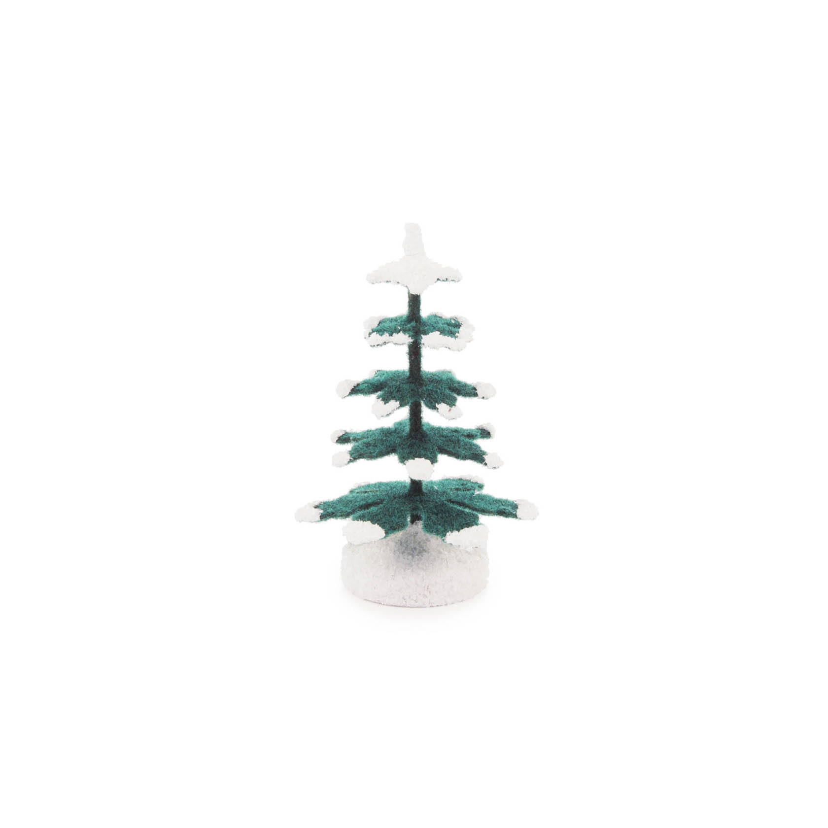 Eine kleine, kunstvolle Fichte mit schneebedeckten Zweigen steht auf einem runden Sockel, insgesamt 6,5 cm hoch. im Dregeno Online Shop günstig kaufen