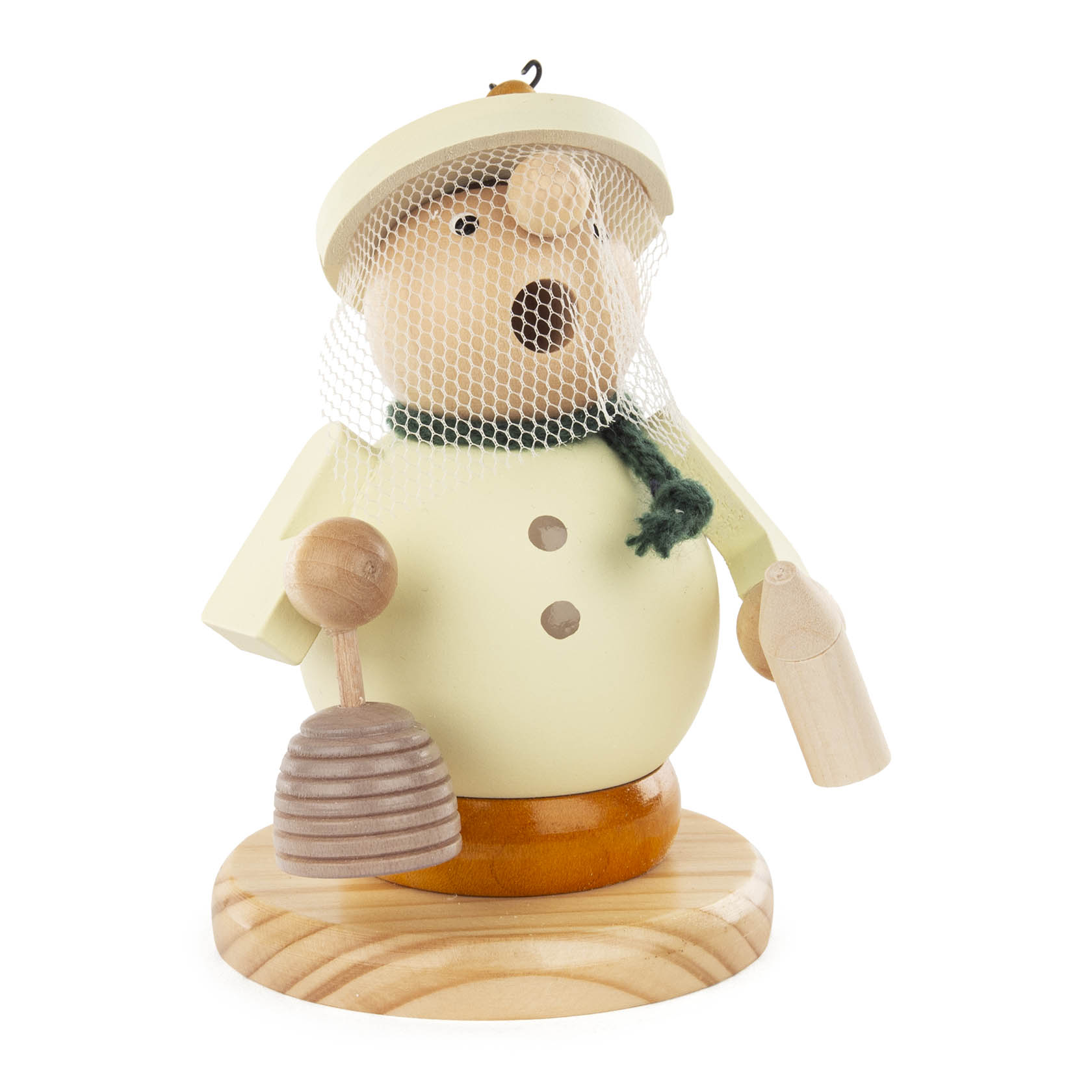 Ein hölzerner Räuchermann in Form eines Imkers mit Bienenschleier, Bienenkorb in der linken Hand und einer kleinen Dose in der rechten Hand.