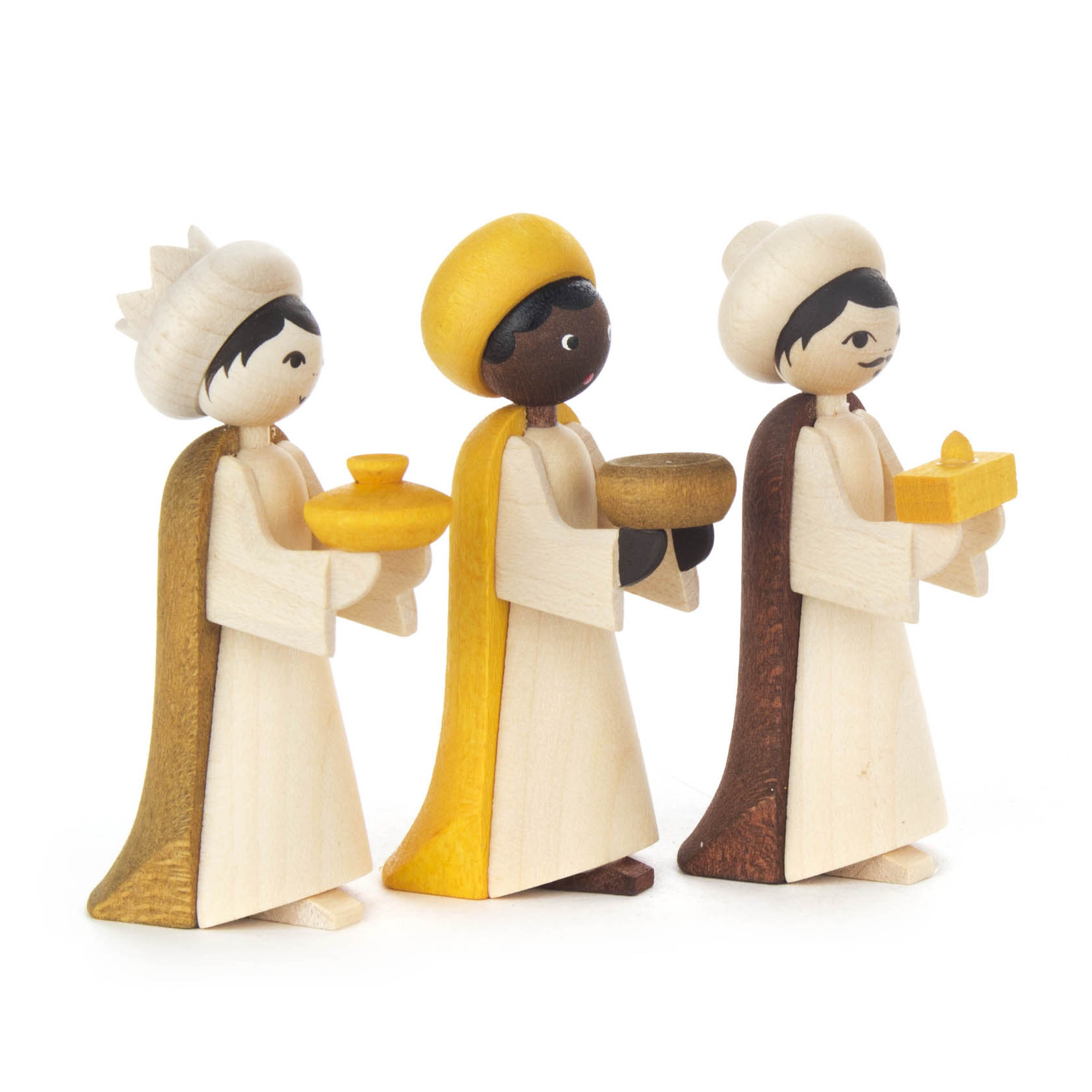 Drei geschnitzte und gebeizte Holzfiguren der Heiligen Drei Könige, jede etwa 7 cm groß, mit verschiedenen Hauttönen und Gaben. im Dregeno Online Shop günstig kaufen