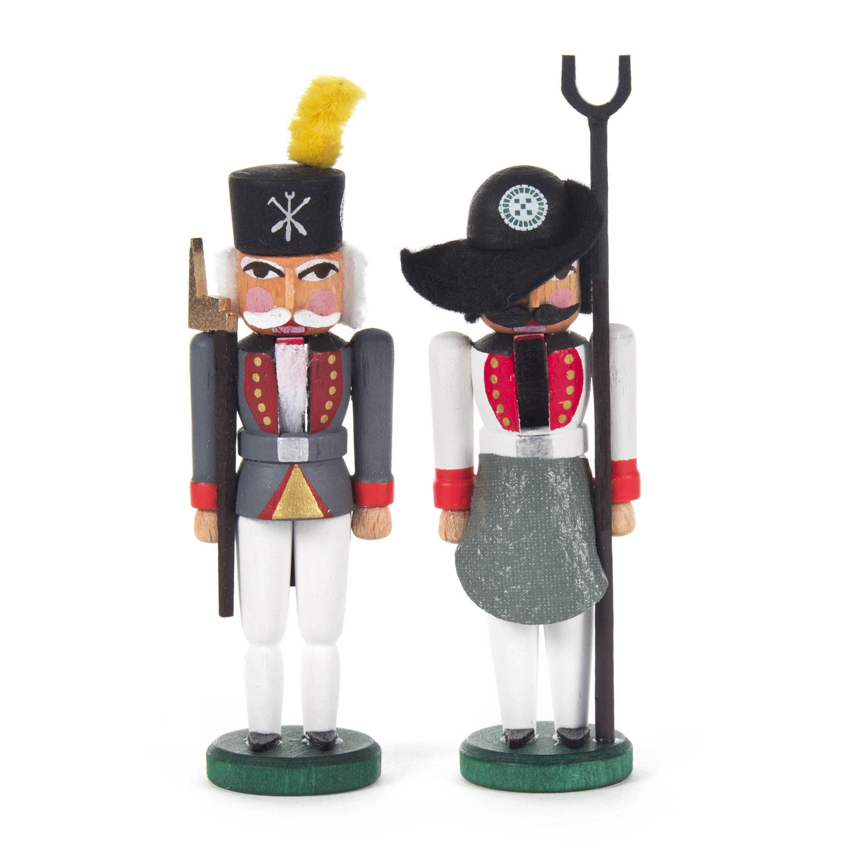 Two miniature nutcracker figures, each 9cm tall. The left one is dressed as a smelter with a tool on his shoulder. The right one is a foundry officer with a staff. im Dregeno Online Shop günstig kaufen