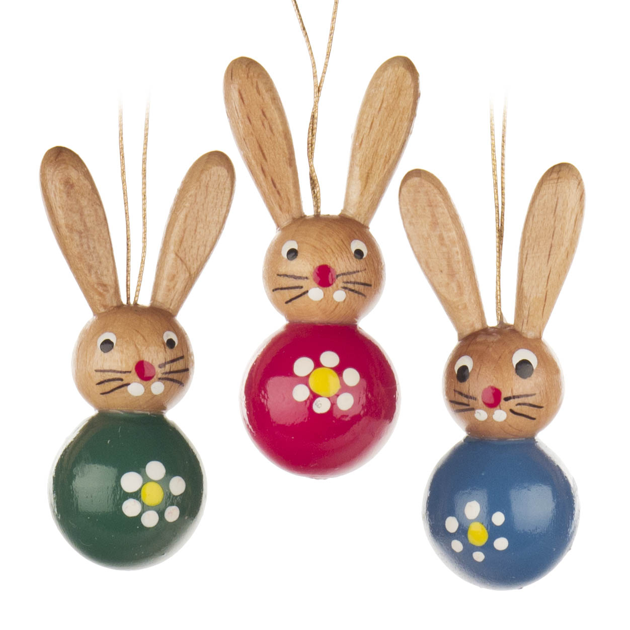 Drei bunte Aufhänger in Form von Hasen, grün, rot und blau, aus Holz mit hängenden Ohren und aufgemalten Gesichtern. im Dregeno Online Shop günstig kaufen