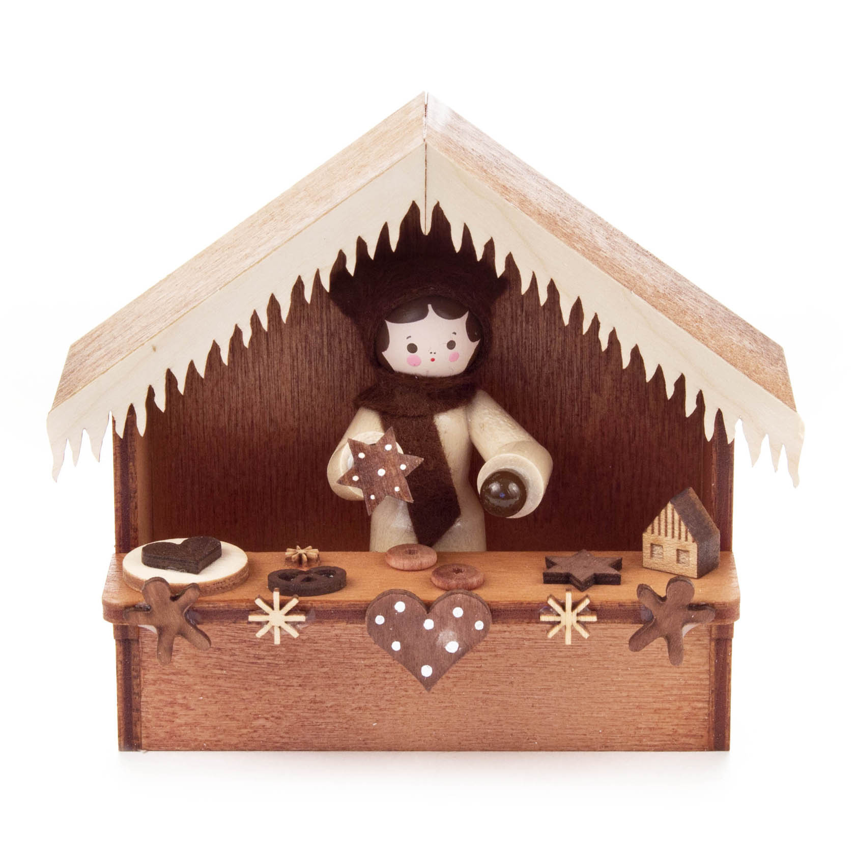 Holzfigur in Weihnachtsmarktbude hält Lebkuchenstern, umgeben von Lebkuchen und Plätzchen. im Dregeno Online Shop günstig kaufen