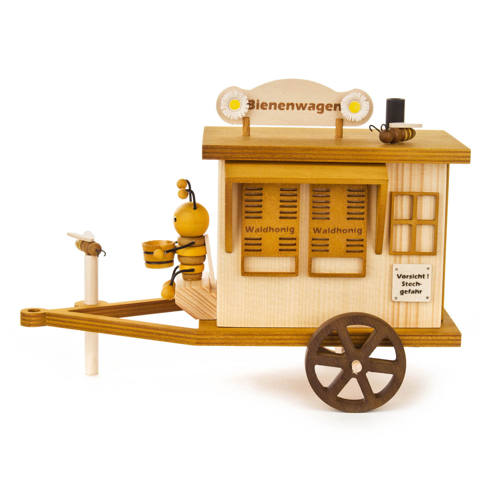 Holzfigur eines Bienenwagens mit einem Bienenmaskottchen, das einen Honigkübel hält. Der Wagen hat Aufschriften 'Waldhonig' und 'Vorsicht, Stechgefahr'.
