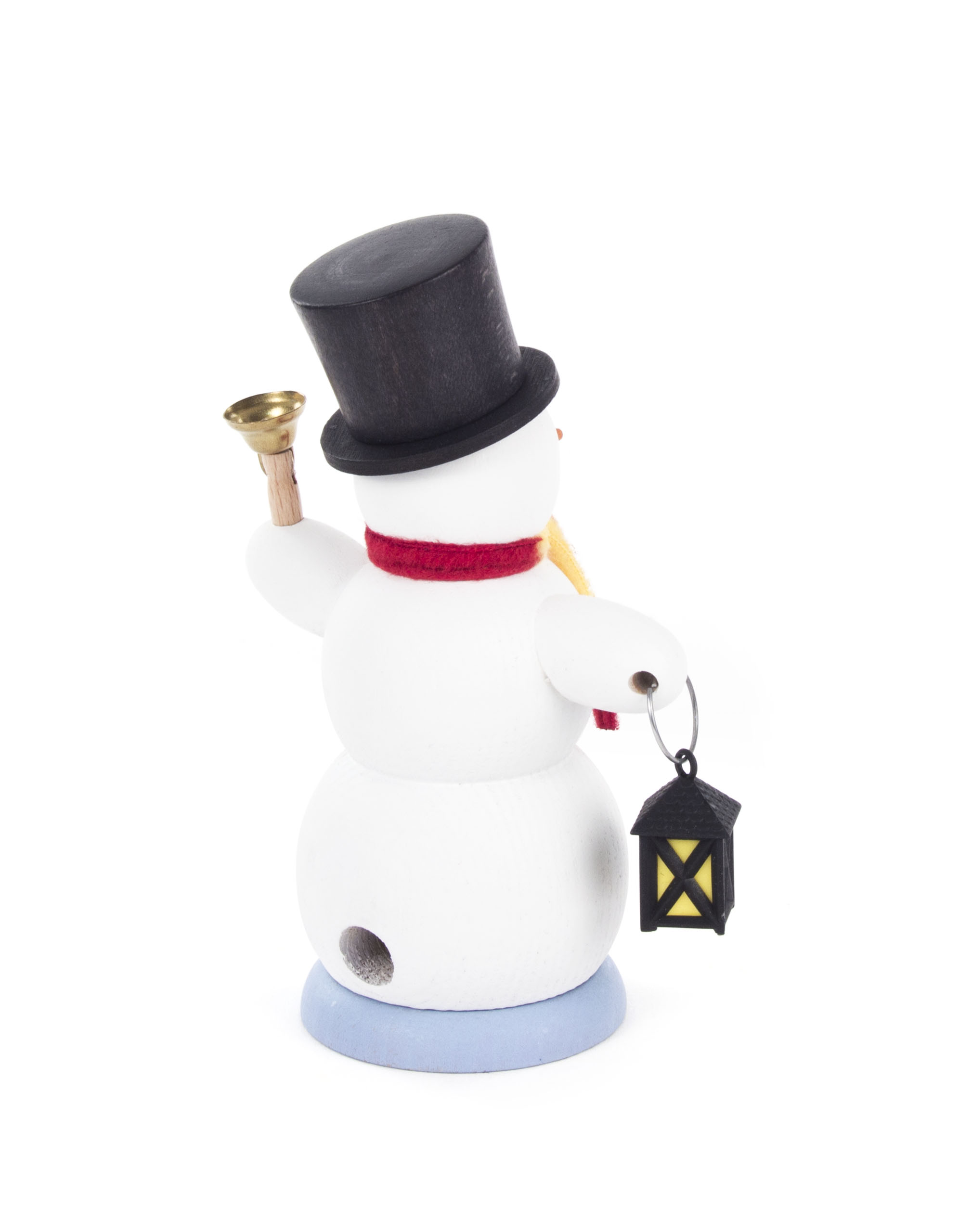 A snowman smoker figurine holding a bell in one hand and a lantern in the other, wearing a red scarf and black top hat.