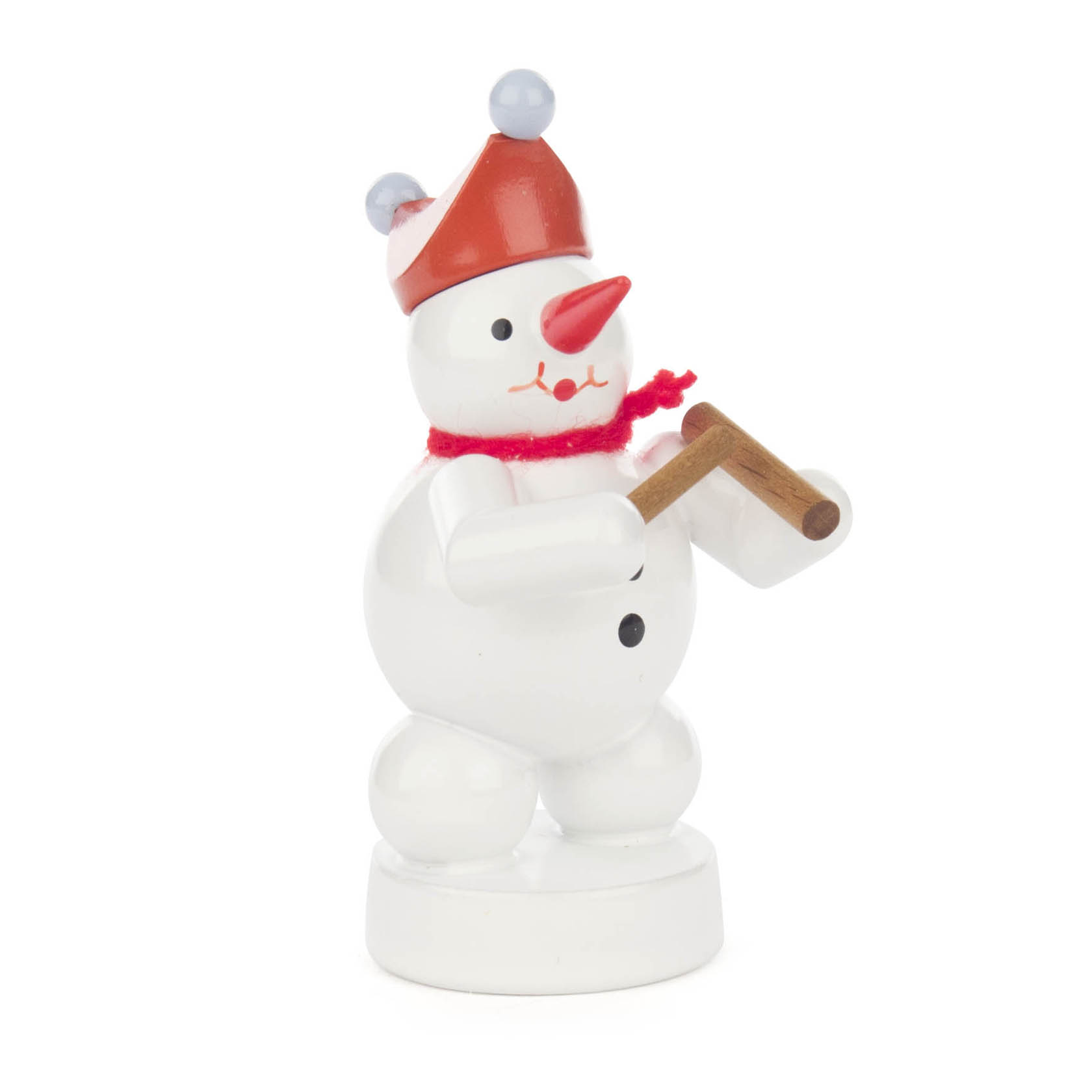 A small, smiling snowman figurine with a red hat and scarf, holding wooden claves in its hands, standing on a white base. im Dregeno Online Shop günstig kaufen