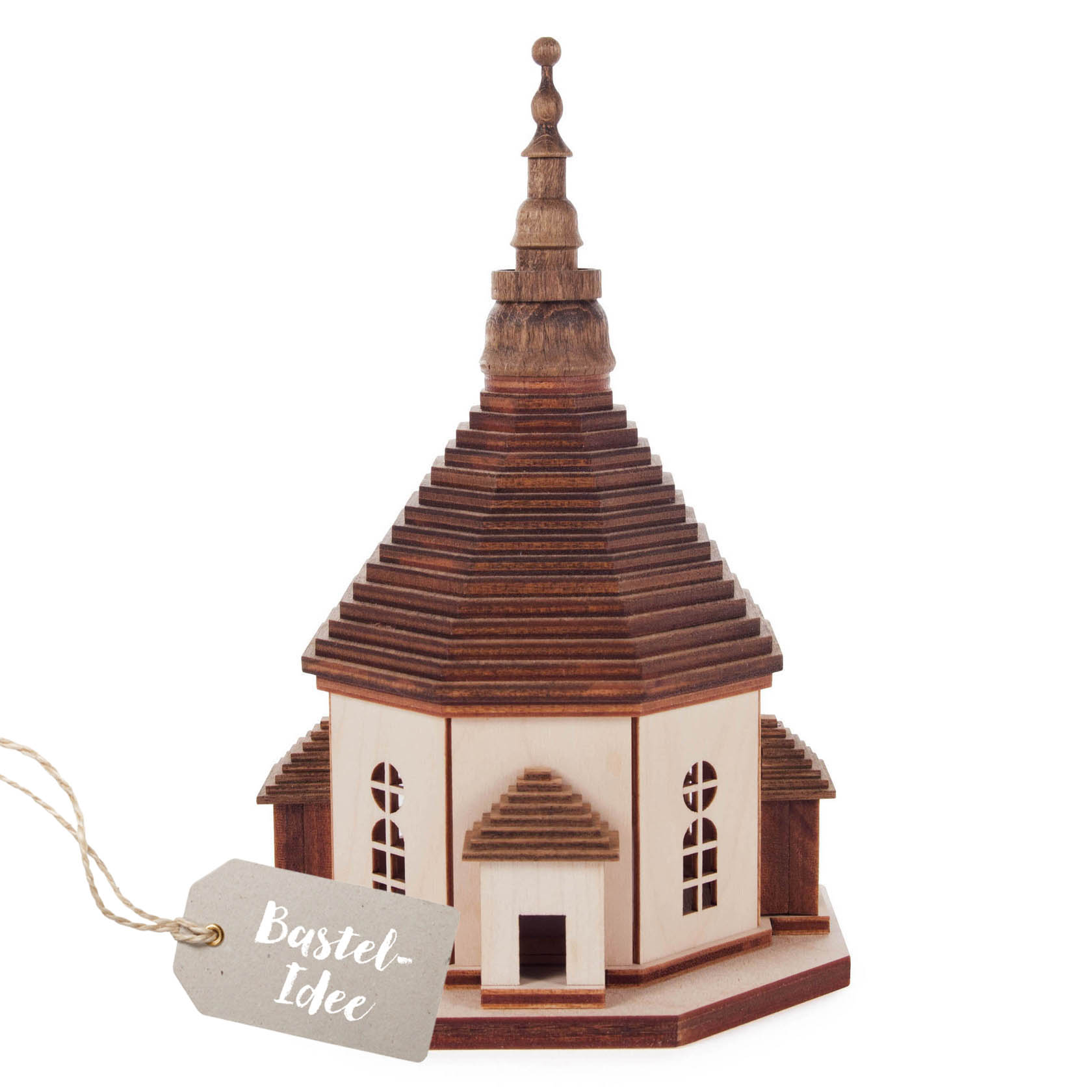 Bastelset der Seiffener Kirche mit sechseckiger Grundform, braunem Treppendach und hervorgehobenen Eingangsbereich.