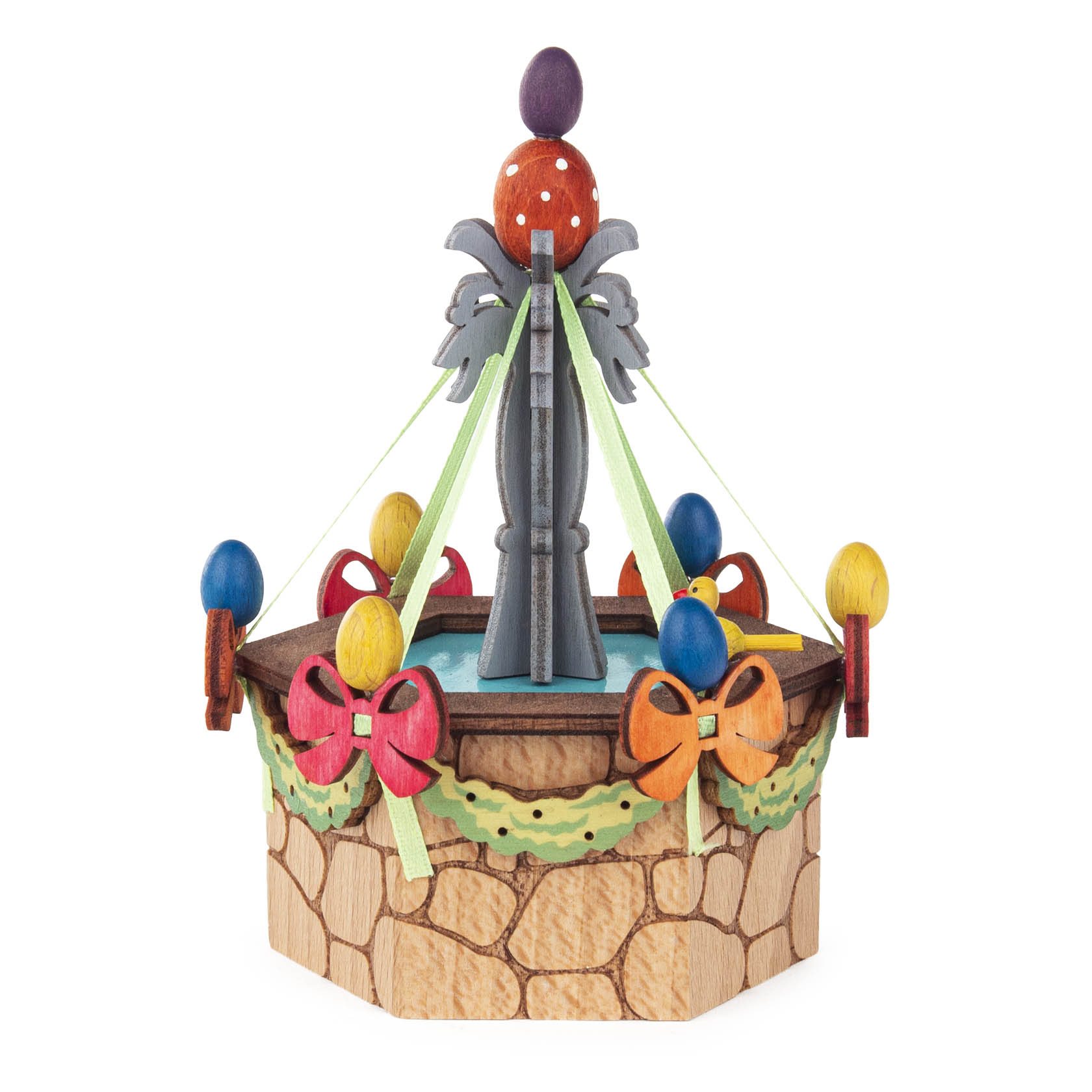Decorative Easter fountain model with colorful egg ornaments and ribbons, placed around a hexagonal stone base. im Dregeno Online Shop günstig kaufen