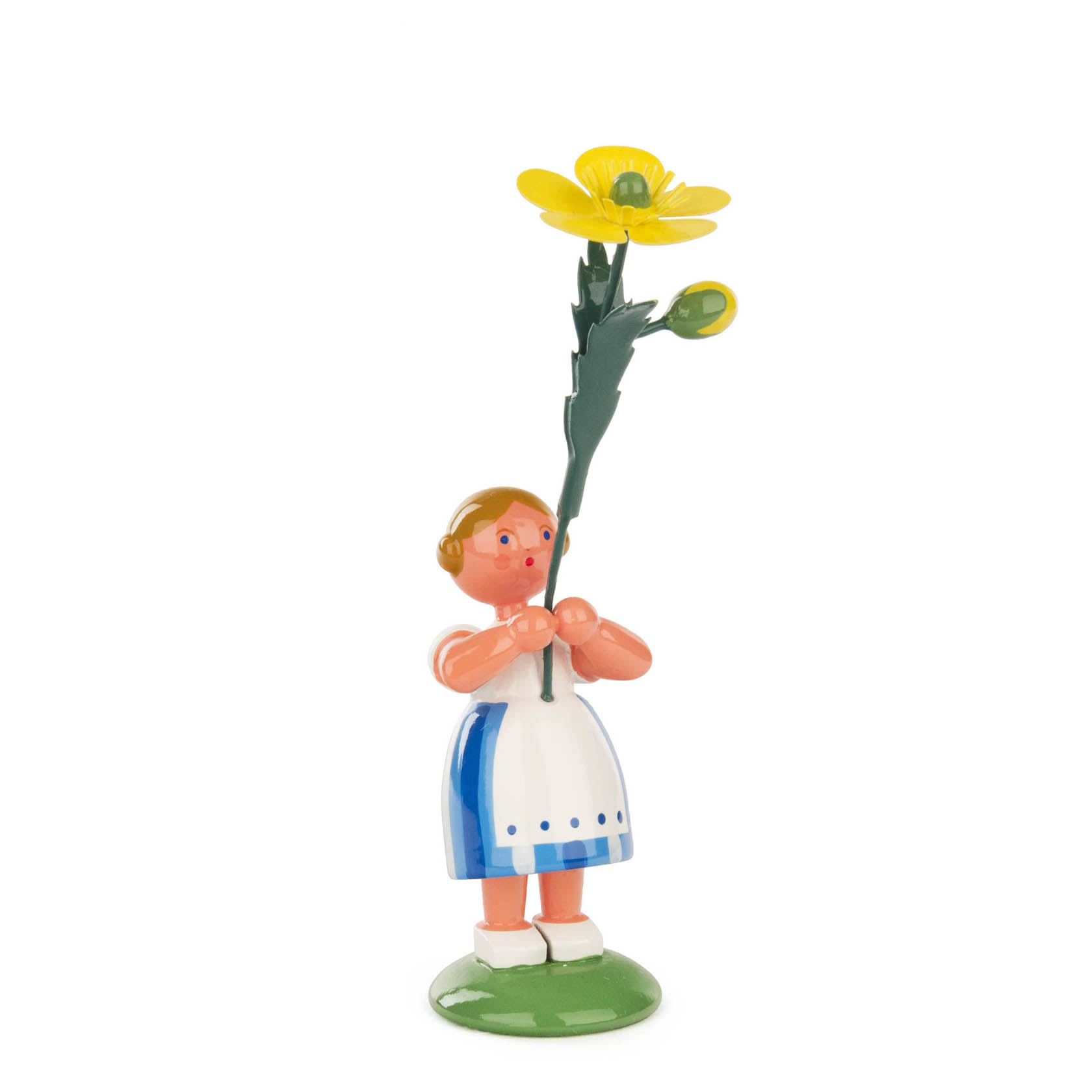 Eine Figur eines Blumenmädchens mit blauer Schürze, das eine große gelbe Butterblume in der Hand hält. im Dregeno Online Shop günstig kaufen