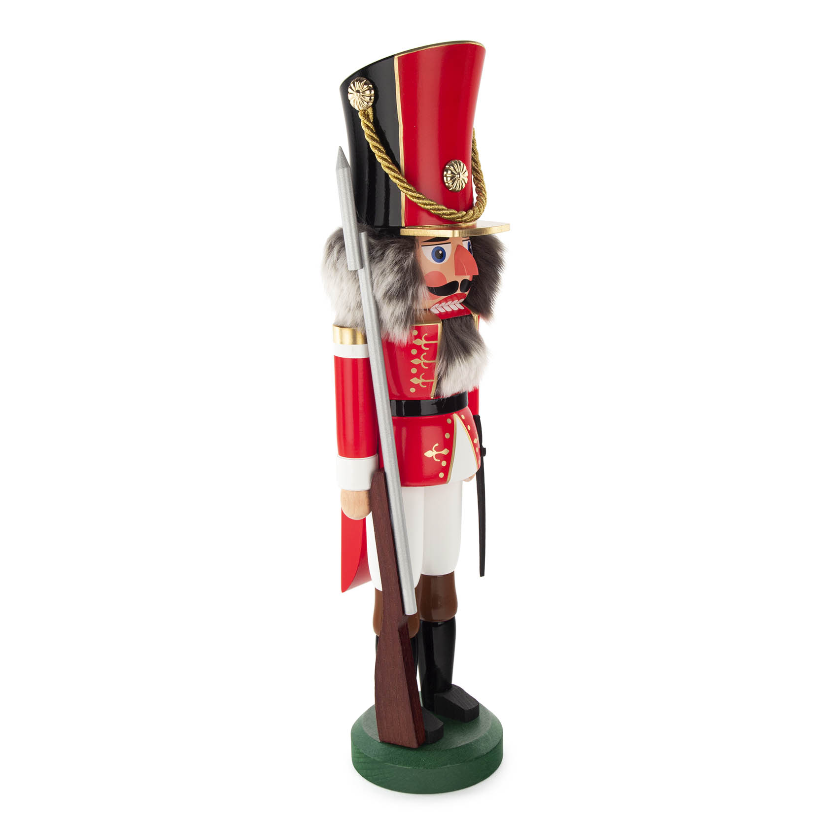 A 45cm tall traditional red nutcracker soldier with a black hat, holding a rifle. It has a painted face with a mustache and fluffy white hair.