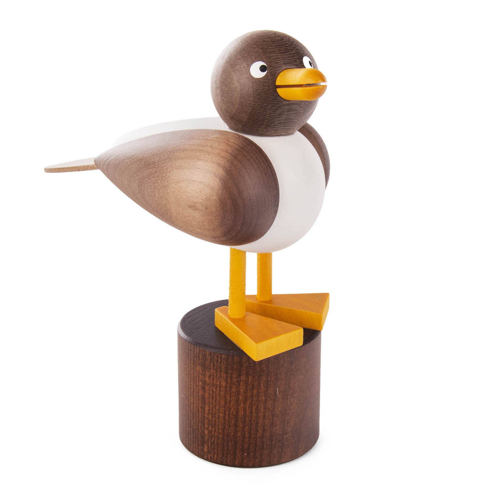 Holzfigur einer Möwe mit grauem Körper und weißen Details, stehend auf einem dunklen Holzsockel. Die Möwe hat gelbe Kunststoffbeine und einen gelben Schnabel. im Dregeno Online Shop günstig kaufen