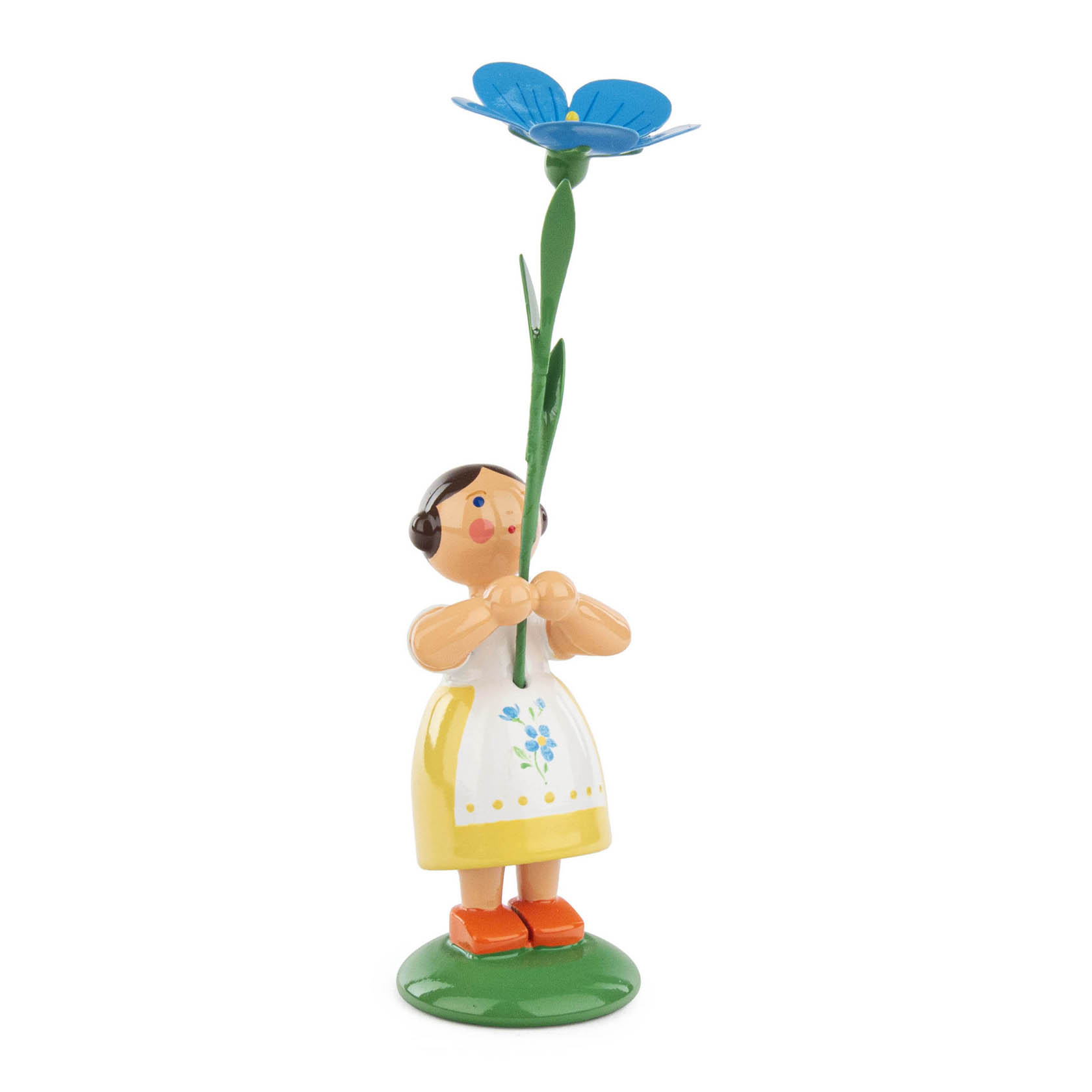 Holzfigur eines Mädchens in gelbem Rock und weißer Schürze mit blauer Blume. im Dregeno Online Shop günstig kaufen