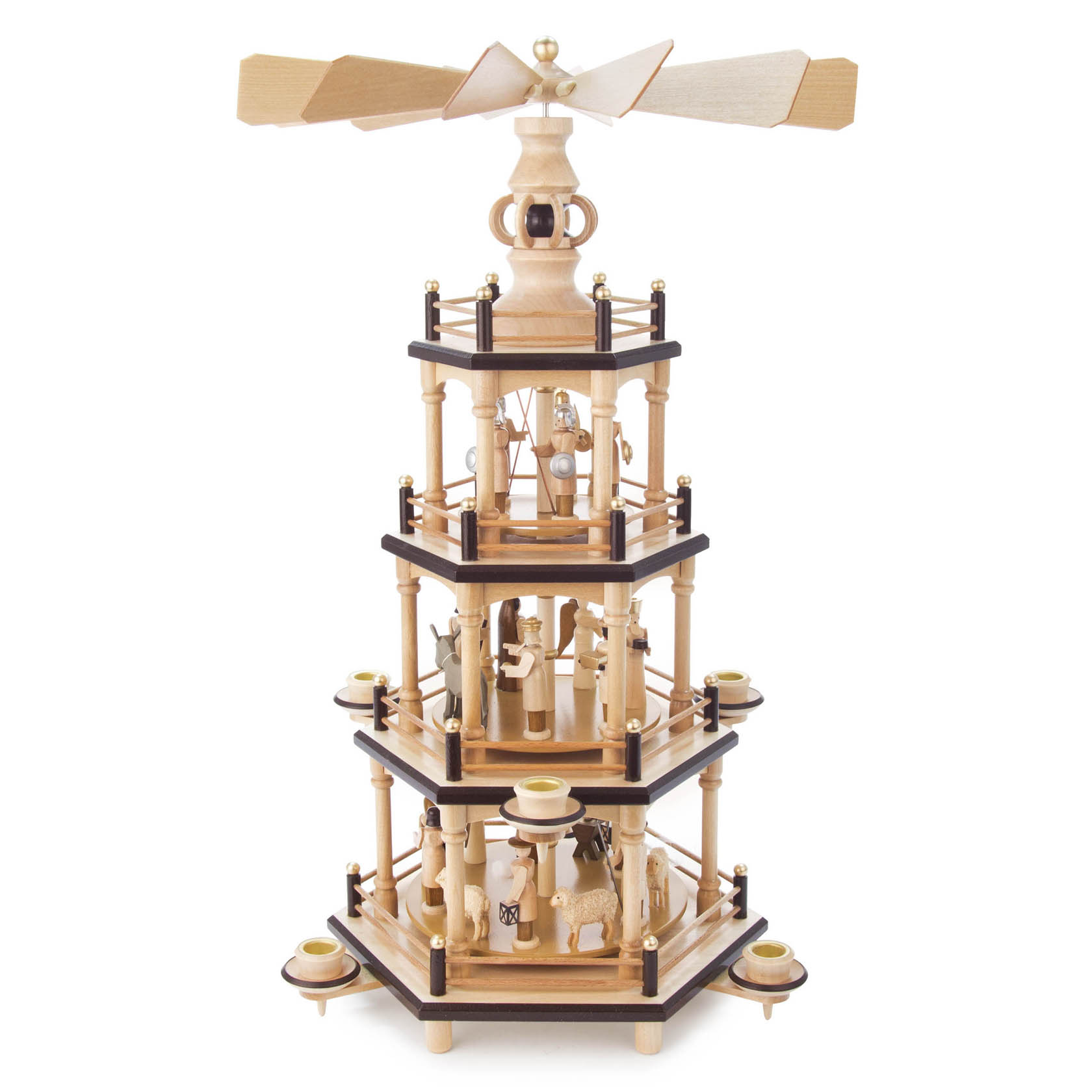 Dreistöckige Holzpyramide mit Figuren der Geburt Christi. Kerzenhalter für 14mm Kerzen an jeder Ecke. Die Pyramide dreht sich durch aufsteigende Wärme.