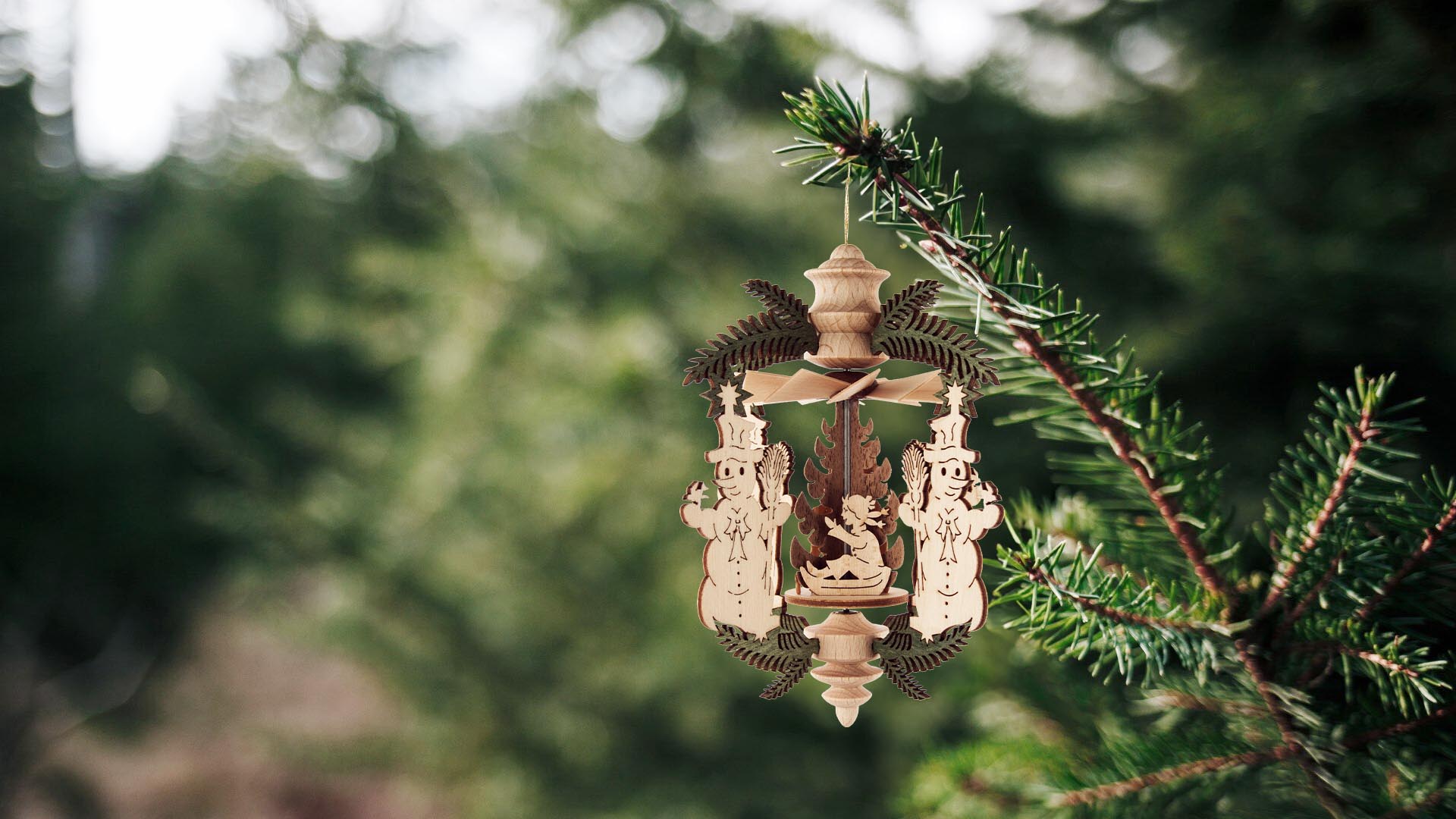 Baumschmuck Wärmespiel mit Weihnachtsmännern