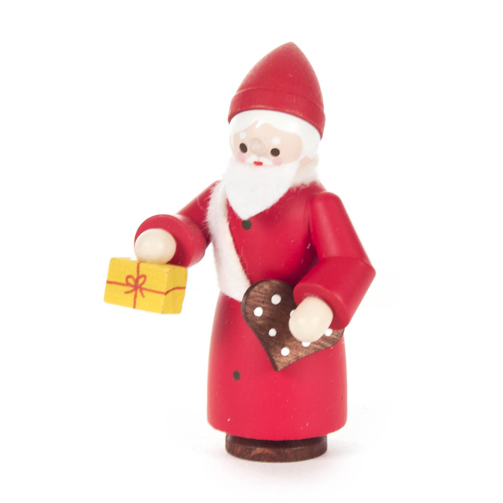 Eine farbige Nikolausfigur aus Holz, die ein Geschenk in der linken Hand und ein Lebkuchenherz in der rechten Hand hält. Gekleidet ist sie in rotem Mantel mit weißem Bart. im Dregeno Online Shop günstig kaufen