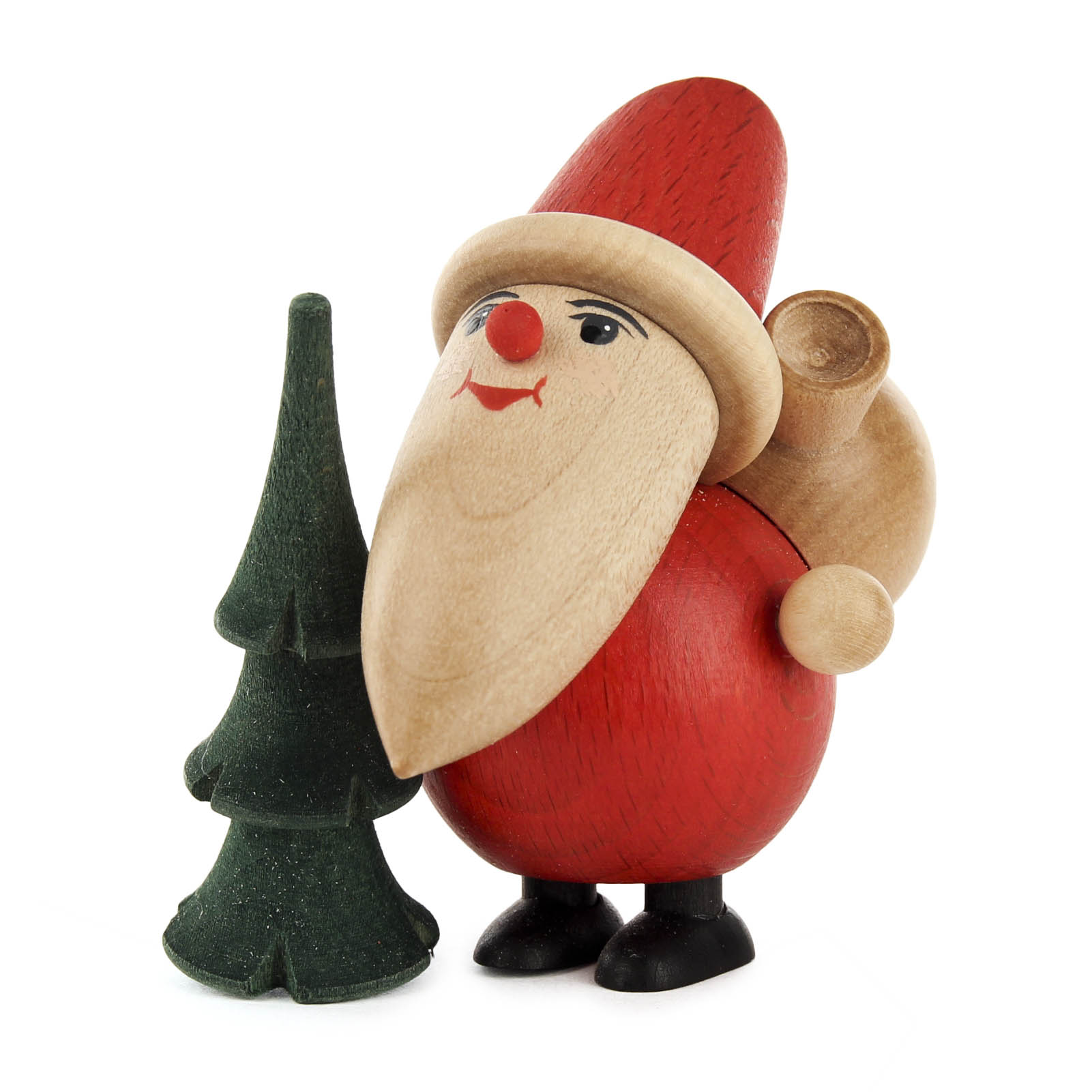 Handgeschnitzter Weihnachtsmann aus Holz mit roter Mütze und Mantel, hält einen kleinen grünen Baum und hat einen Sack auf dem Rücken. im Dregeno Online Shop günstig kaufen