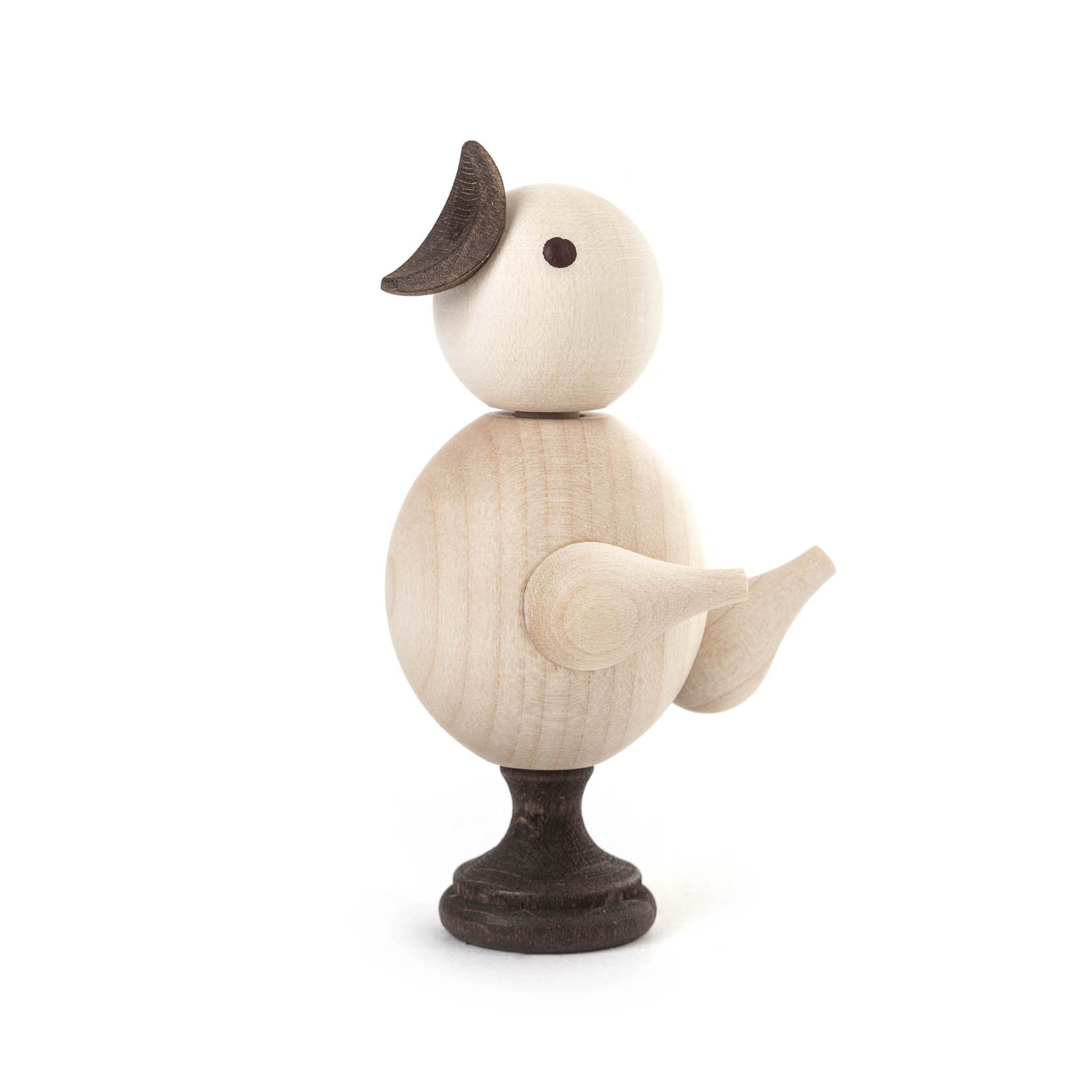 Holzfigur eines Kükens in natürlicher Holzfarbe, mit rundem Körper, abstehendem Flügel, dunklem Schnabel und dunkelbraunen Füßen. im Dregeno Online Shop günstig kaufen
