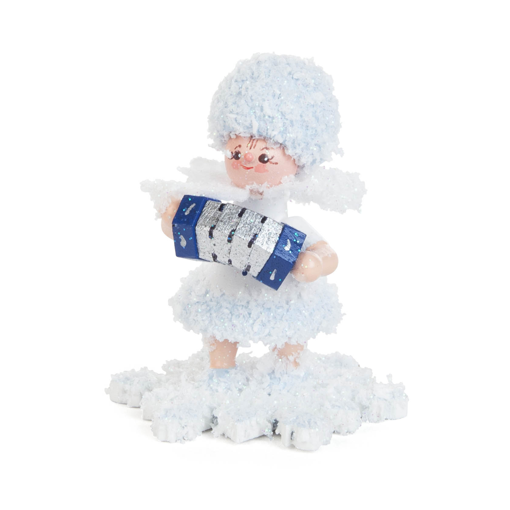 A small figurine of a snowflake girl with a fluffy blue outfit and hat, holding a blue concertina accordion, standing on a snow-like base. im Dregeno Online Shop günstig kaufen