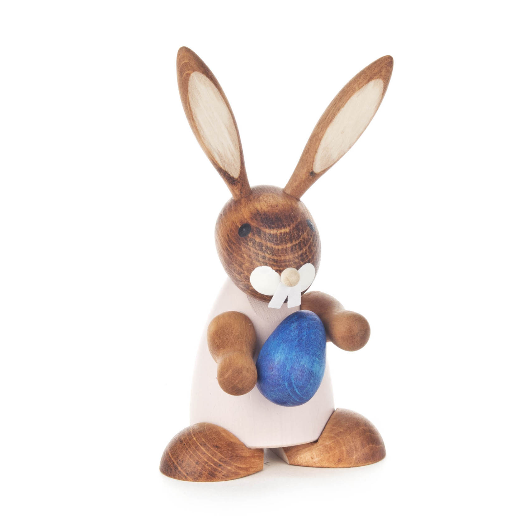 Holzhase mit lila Bemalung hält ein blaues Ei in den Händen. im Dregeno Online Shop günstig kaufen