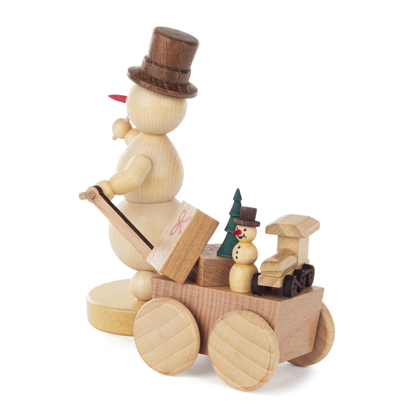 Holz-Schneemann mit Zylinder zieht einen kleinen Wagen, auf dem ein weiterer Schneemann, ein Tannenbaum und Spielzeug stehen.