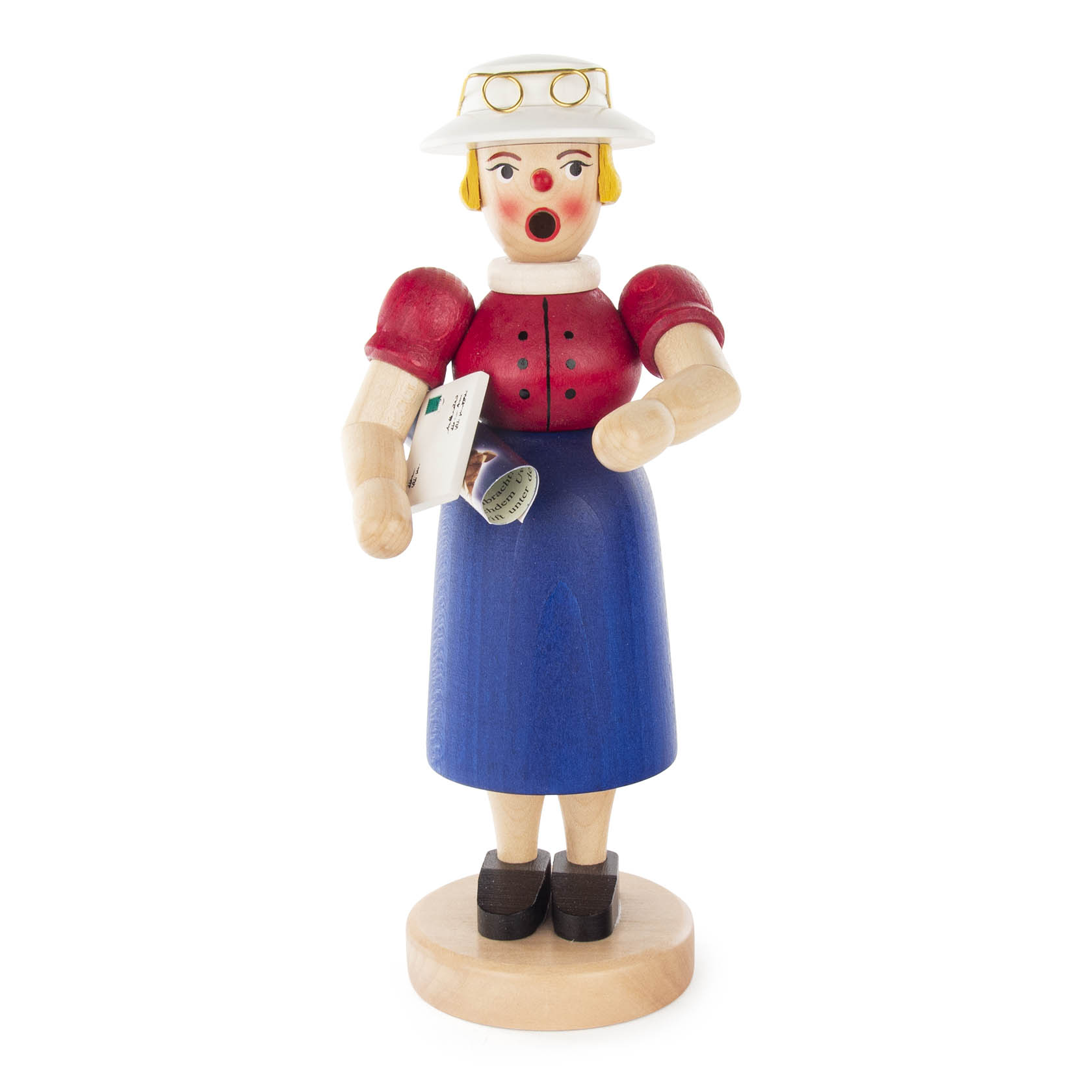 Holzfigur einer Räucherfrau als Sekretärin mit Hut, Brille, roter Bluse und blauer Rock, eine Zeitung oder Brief in der Hand haltend. im Dregeno Online Shop günstig kaufen