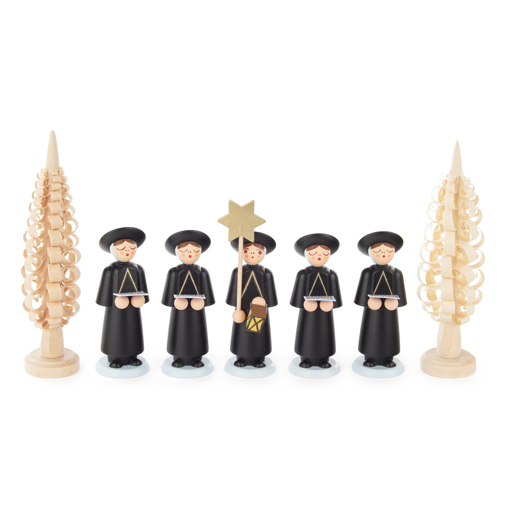 Sechs schwarze Kurrendefiguren aus Holz, fünf tragen Gesangbücher, eine Figur hält einen Stern und eine Laterne, flankiert von zwei Holz-Spanbäumchen. im Dregeno Online Shop günstig kaufen