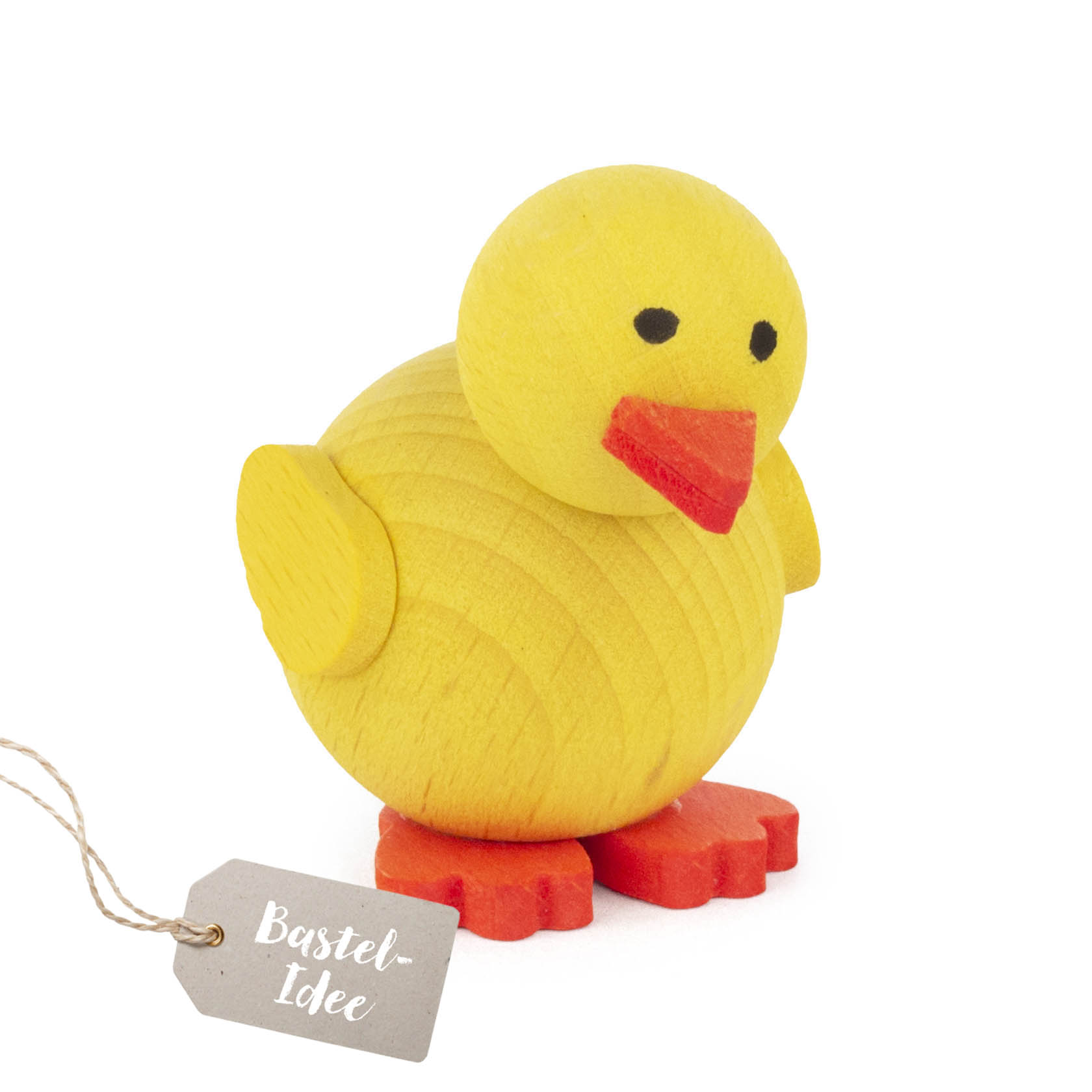 A do-it-yourself kit for assembling a 5cm yellow chick, including a sphere for the body, a smaller sphere for the head, orange beak, wings, and feet. im Dregeno Online Shop günstig kaufen
