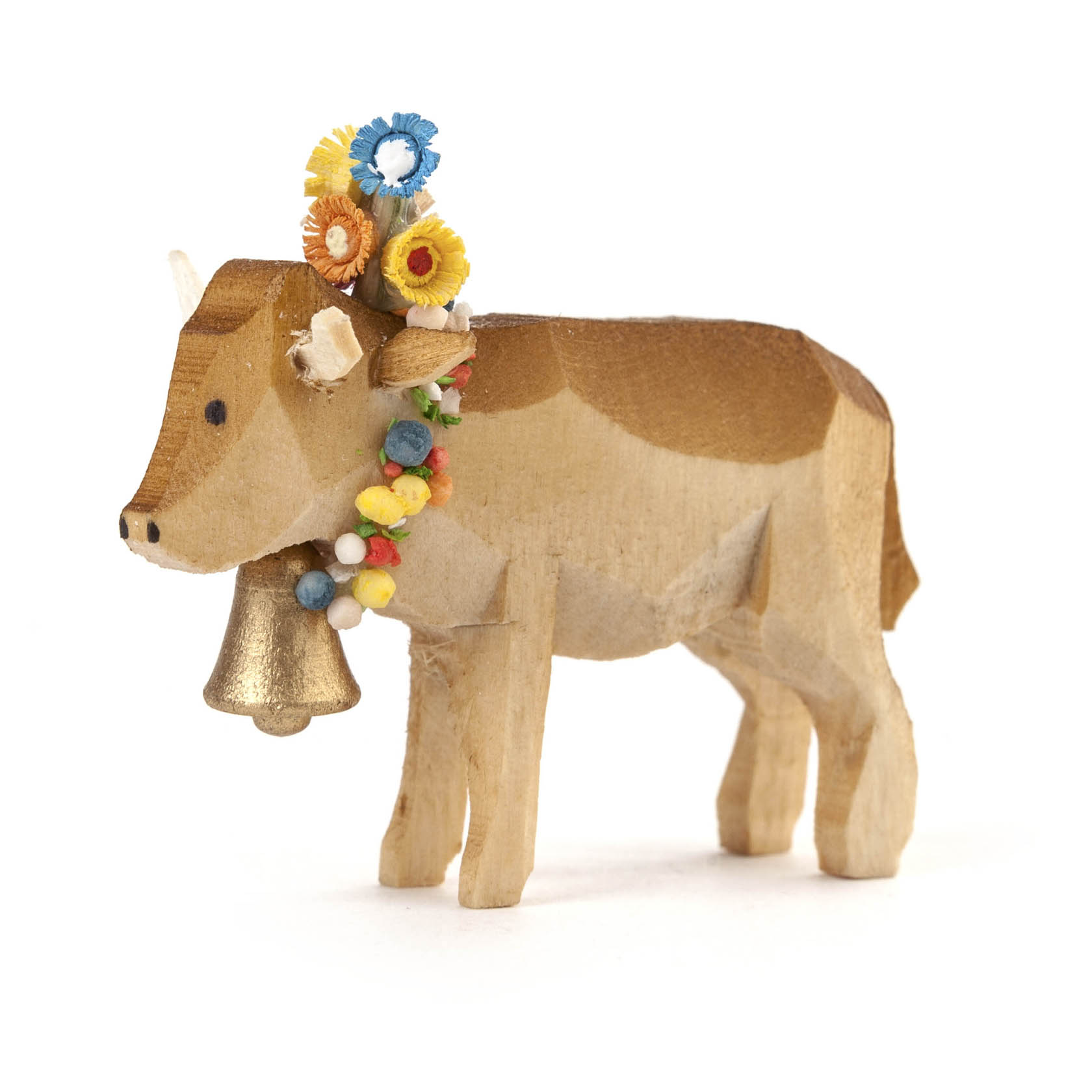 Holzfigur einer Kuh mit Almabtrieb-Schmuck, umfasst bunte Blumen und eine Glocke um den Hals. im Dregeno Online Shop günstig kaufen