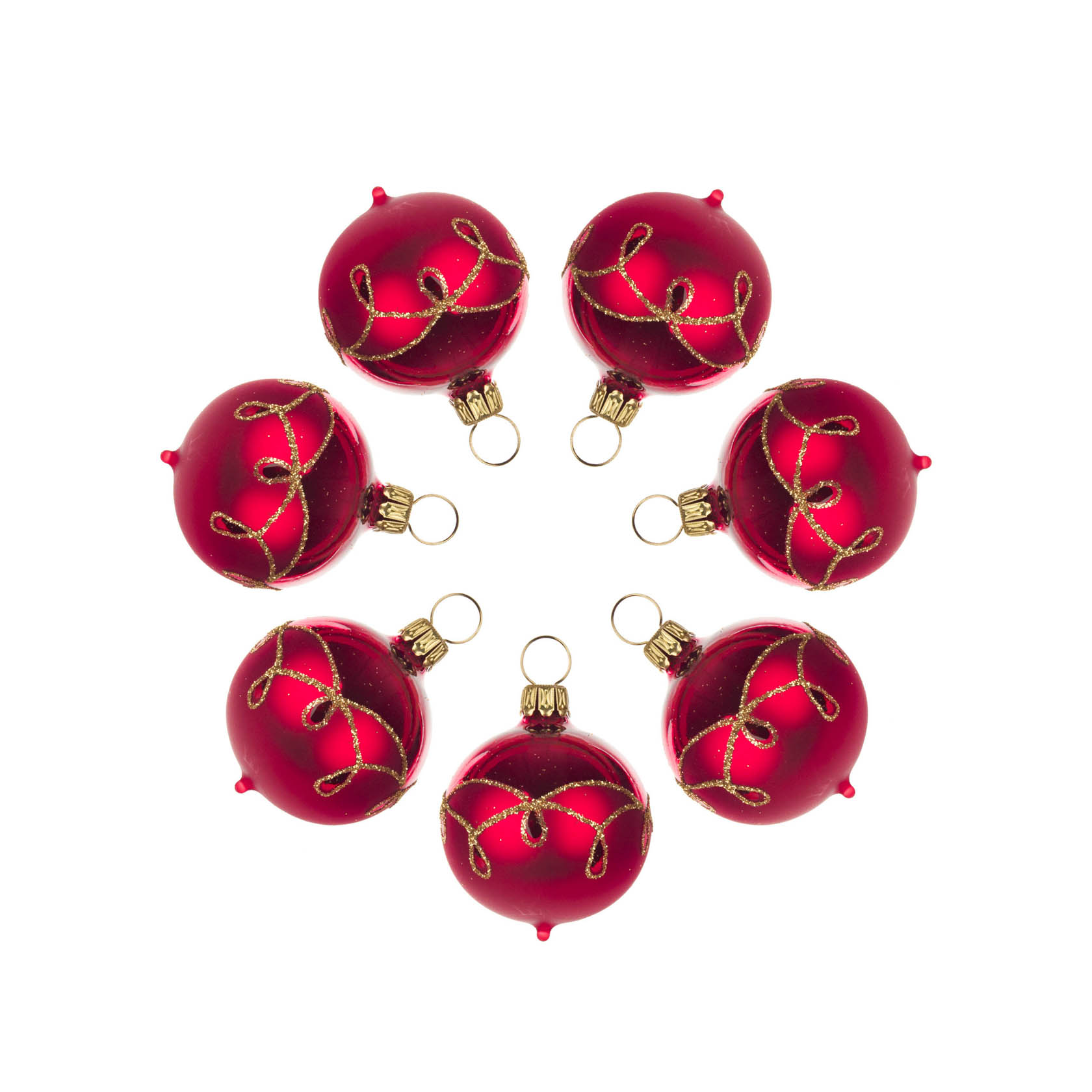 Sieben rote, matte Christbaumkugeln mit goldenem Tropfenmuster im Kreis angeordnet. im Dregeno Online Shop günstig kaufen