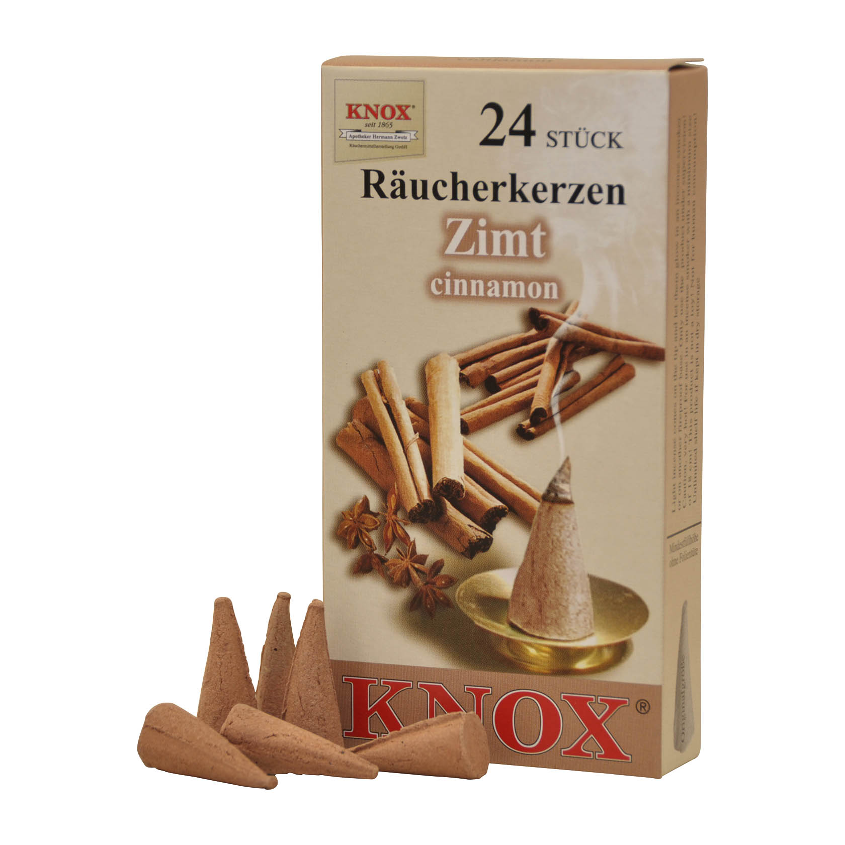 Packung mit 24 KNOX Räucherkerzen Zimt, Bild zeigt eine angezündete Räucherkerze auf einem Teller, daneben Zimtstangen und Anisstern. im Dregeno Online Shop günstig kaufen
