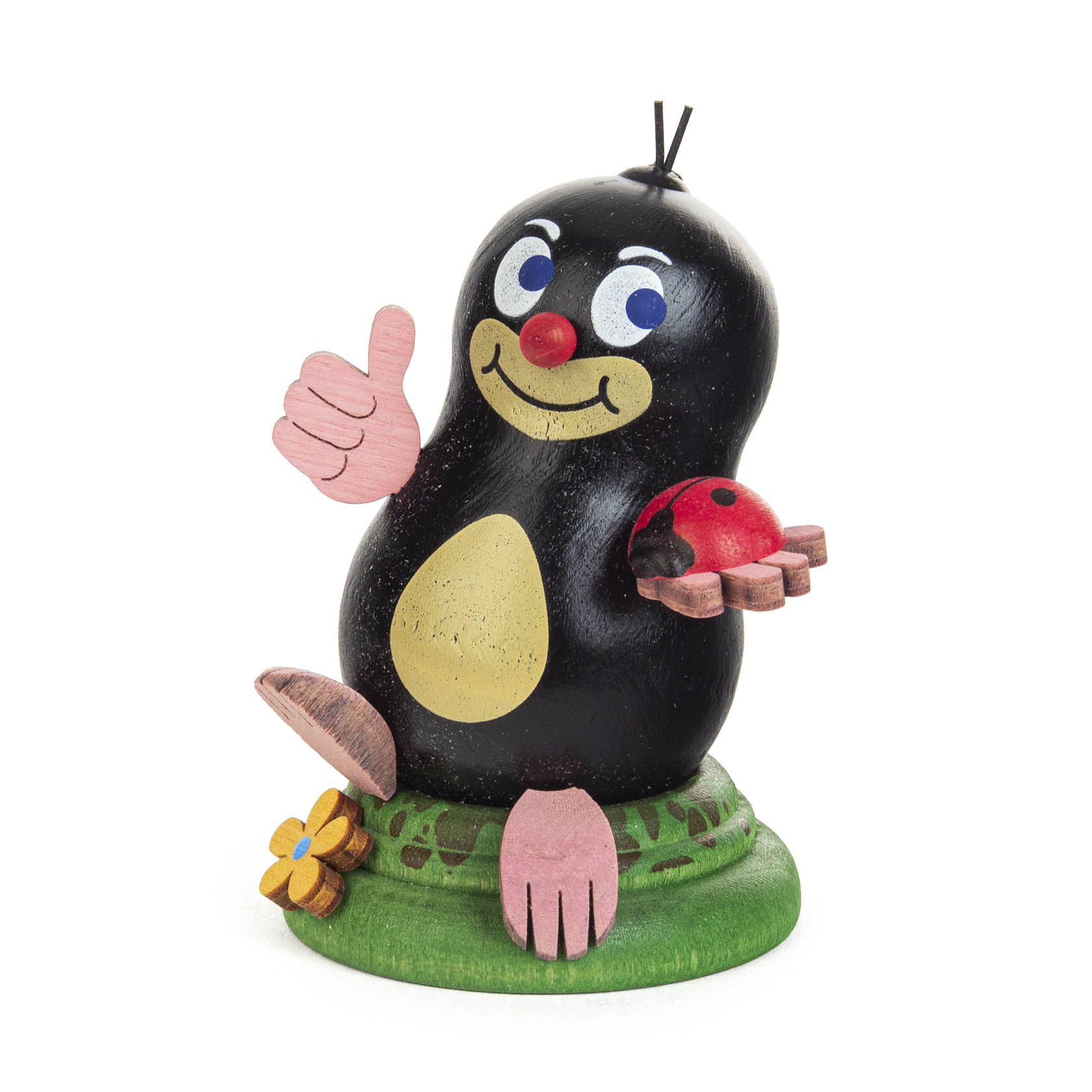 A wooden figurine of a smiling mole named Michel with a red nose, holding a red ladybug in one hand and giving a thumbs-up with the other. im Dregeno Online Shop günstig kaufen