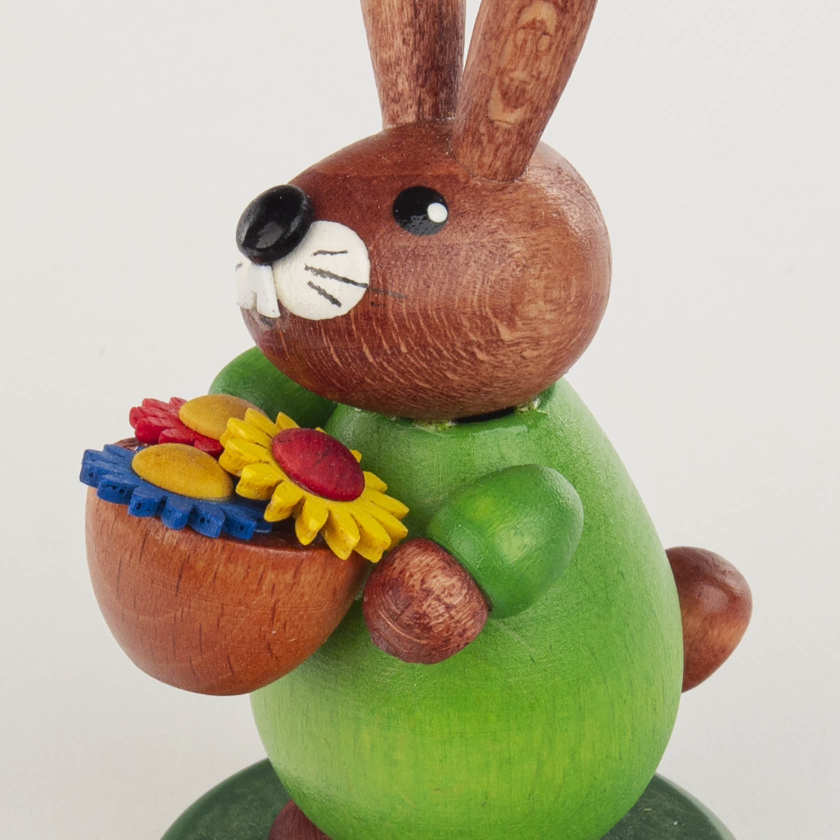 wooden easter rabbit with flower basket