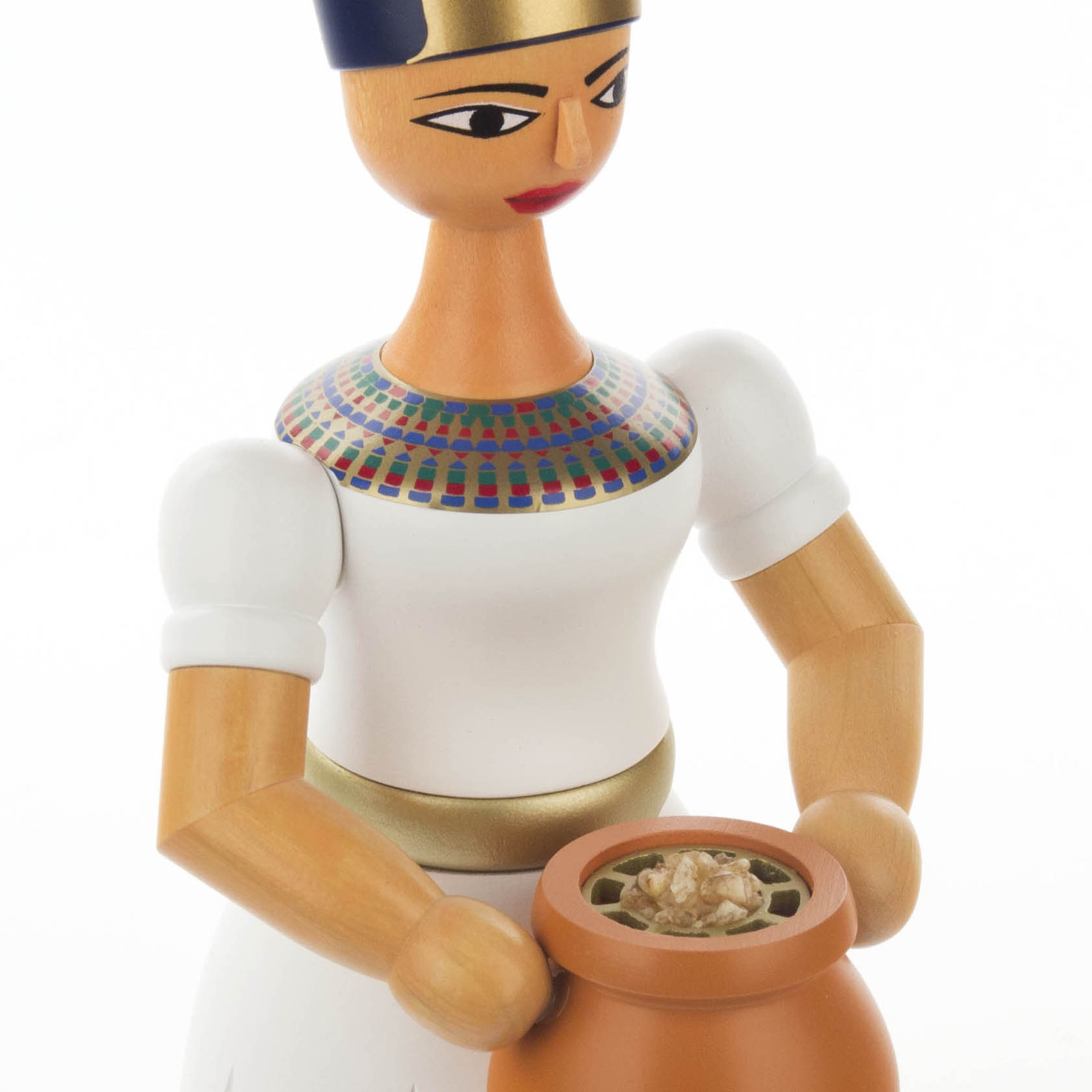 Wooden incense smoker figure of Nefertiti, wearing a white dress, a gold belt, and a traditional Egyptian collar while holding a brown pot.