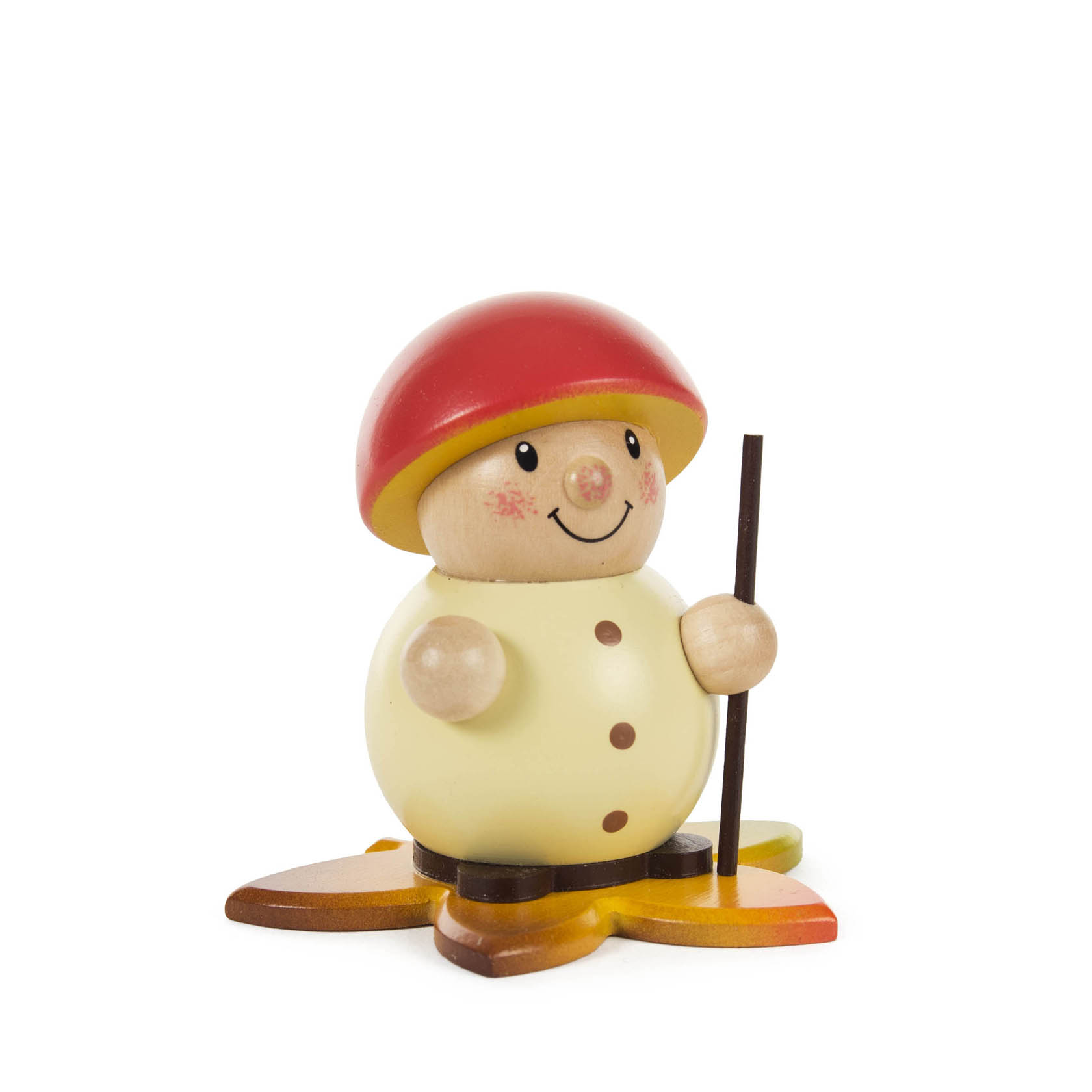 Drechselarbeit einer lächelnden Figur mit roter Kappe und Stock, steht auf einem bunten Sockel. im Dregeno Online Shop günstig kaufen