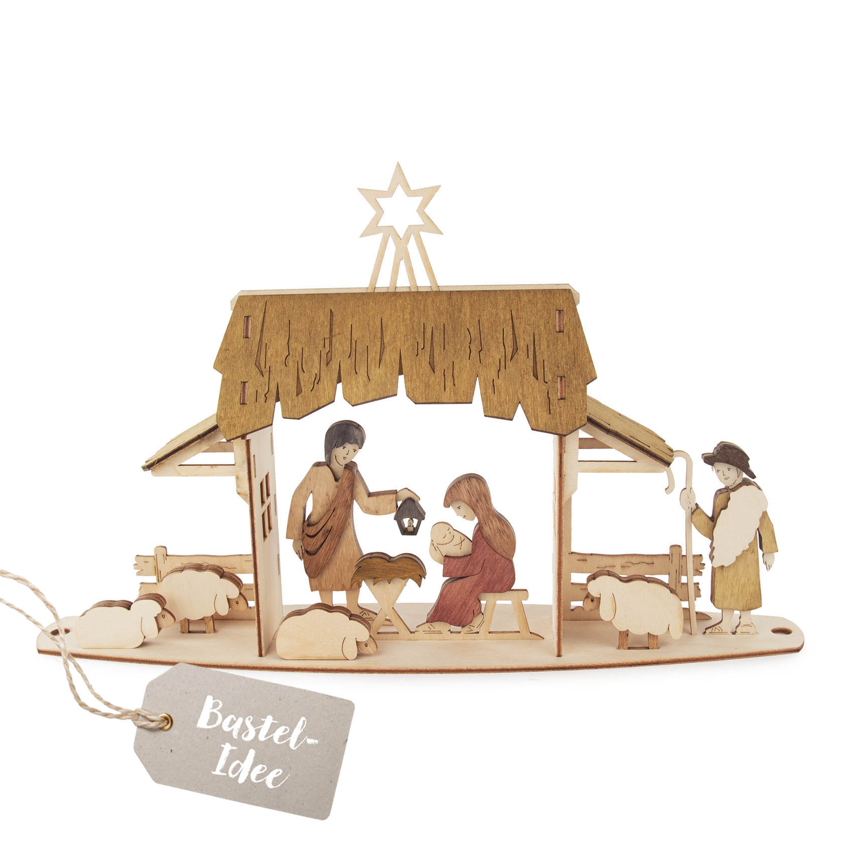 Ein Bastelset zeigt eine Krippen-Szene aus Holz mit Maria, Josef und dem Jesuskind in der Krippe, umgeben von einem Hirten und Schafen. im Dregeno Online Shop günstig kaufen