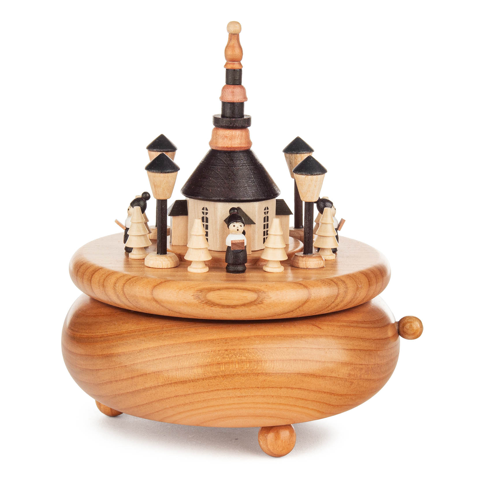 Spieldose aus Holz mit der Seiffener Kirche und kleinen Kurrende-Figuren, gefertigt im Erzgebirge, spielt die Melodie 'Süßer die Glocken nie klingen'. im Dregeno Online Shop günstig kaufen