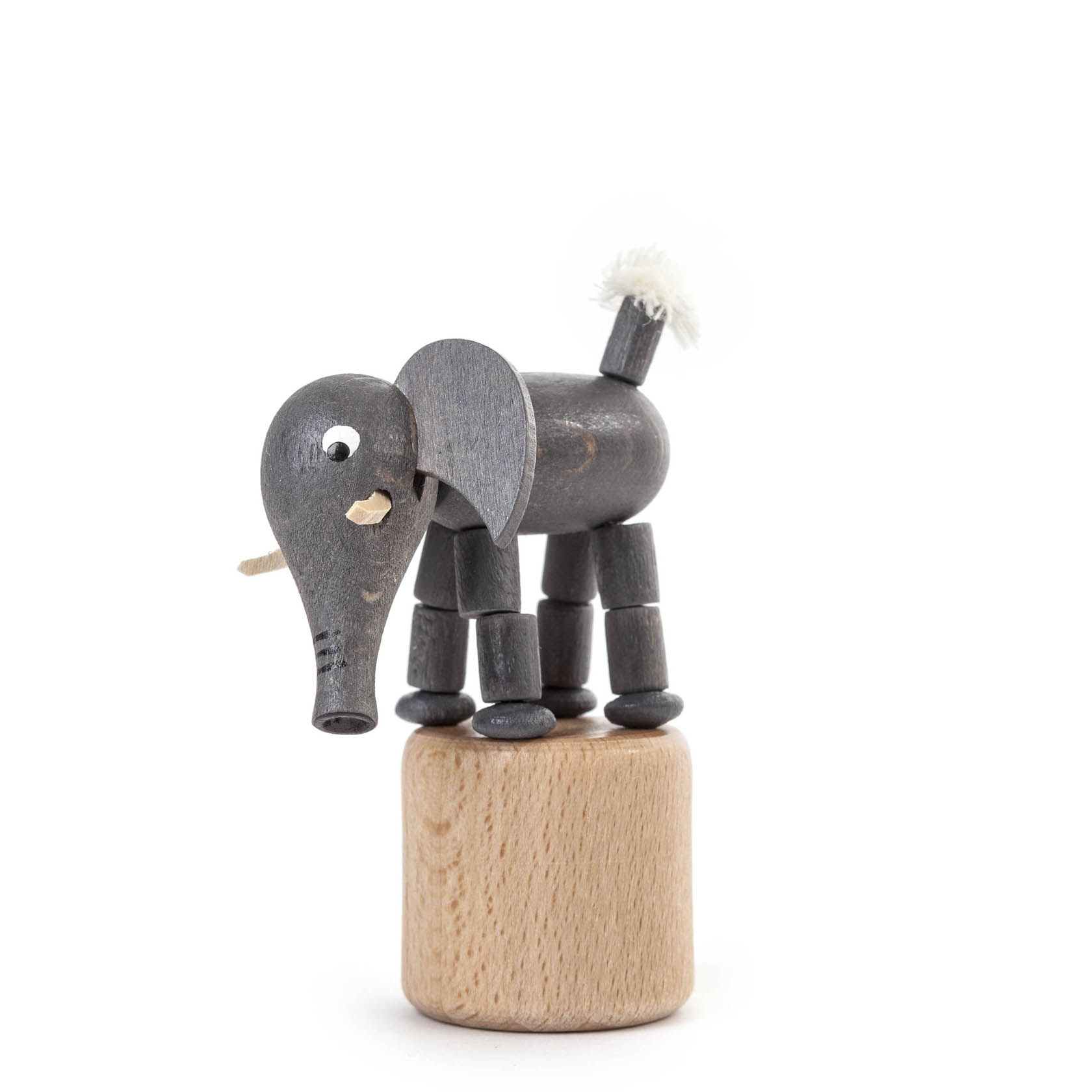 Holzspielzeug eines Wackeltieres in Form eines Elefanten auf einer runden Basis. Der Elefant ist grau mit beweglichen Gliedern und einem weißen Schwanz. im Dregeno Online Shop günstig kaufen