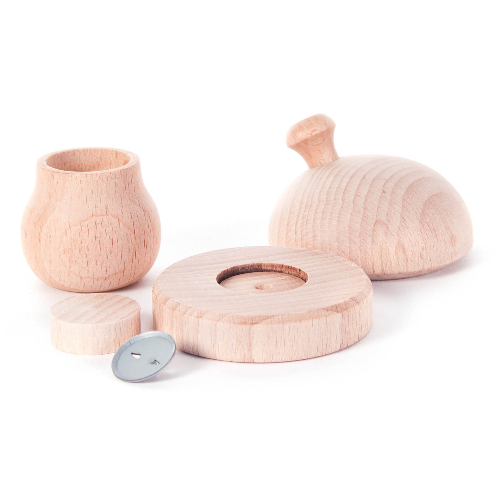Ein Bastelset für einen Räucherpilz aus hellem Holz, bestehend aus einem pilzförmigen Deckel, einem runden Unterteil, einem kleinen Holzfass und einem Deckel.