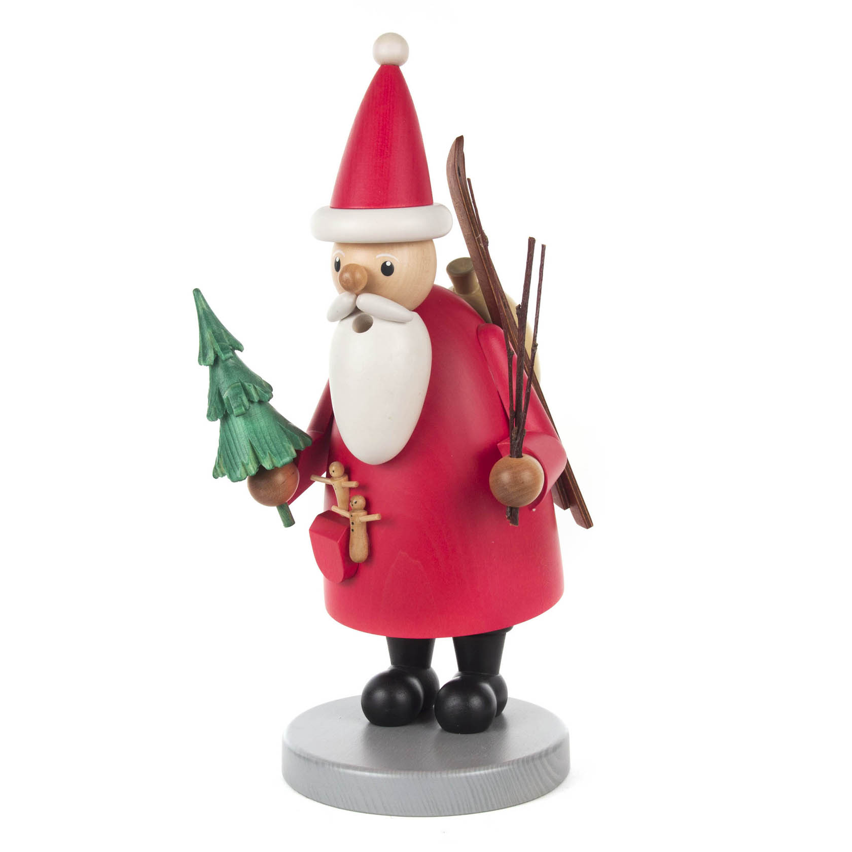 Holzfigur eines Räuchermanns in Form eines Weihnachtsmanns mit rotem Mantel, Zipfelmütze, langem weißen Bart, einem Baum in der linken Hand und Skier auf dem Rücken. im Dregeno Online Shop günstig kaufen