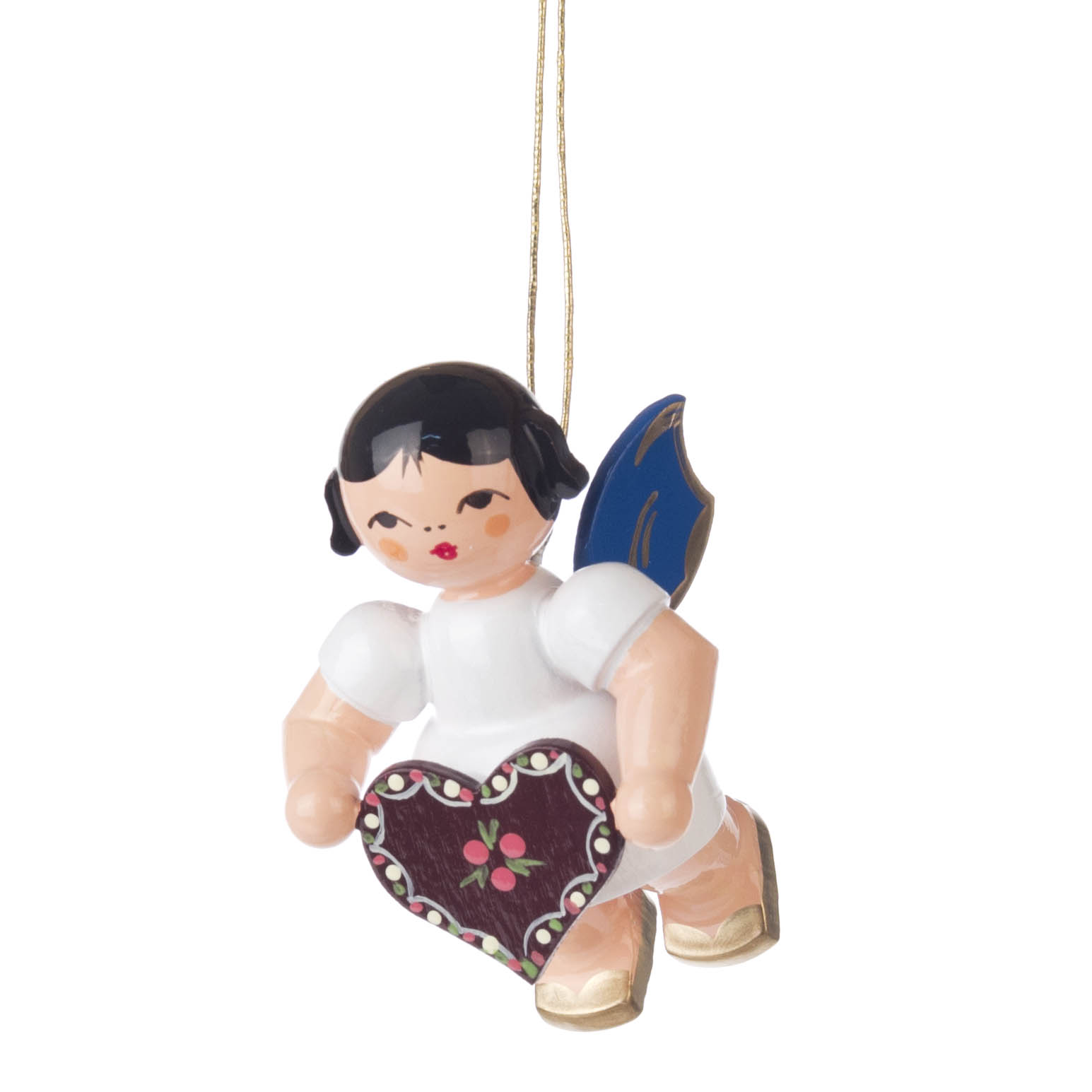 Eine kleine Engelsfigur mit blauen Flügeln hält ein Lebkuchenherz in den Händen. Der Engel hat dunkles Haar und trägt weiße Kleidung. im Dregeno Online Shop günstig kaufen