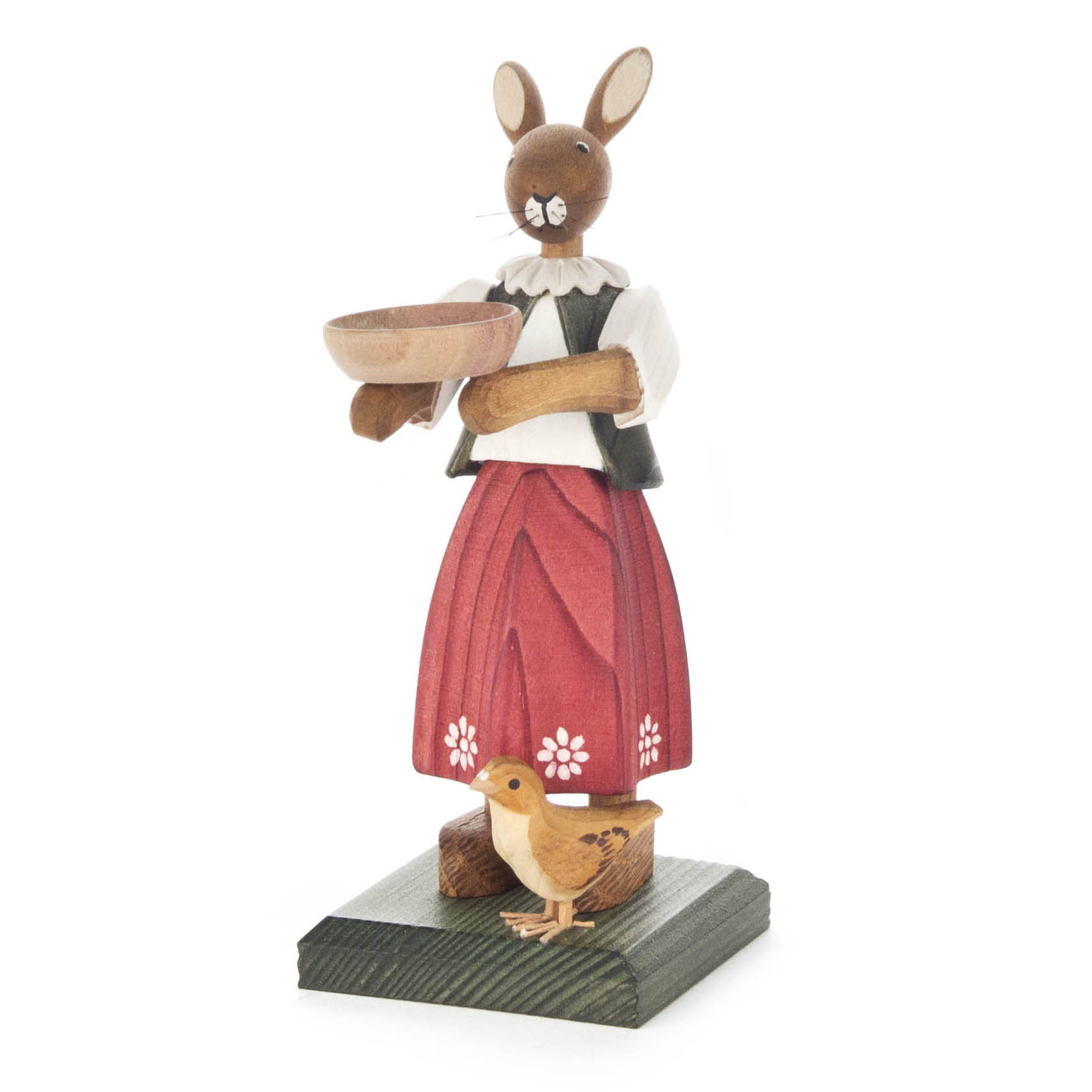 Holzfigur eines Hasenmädchens im Kleid mit Schüssel in den Händen, ein gelbes Küken steht zu ihren Füßen. im Dregeno Online Shop günstig kaufen