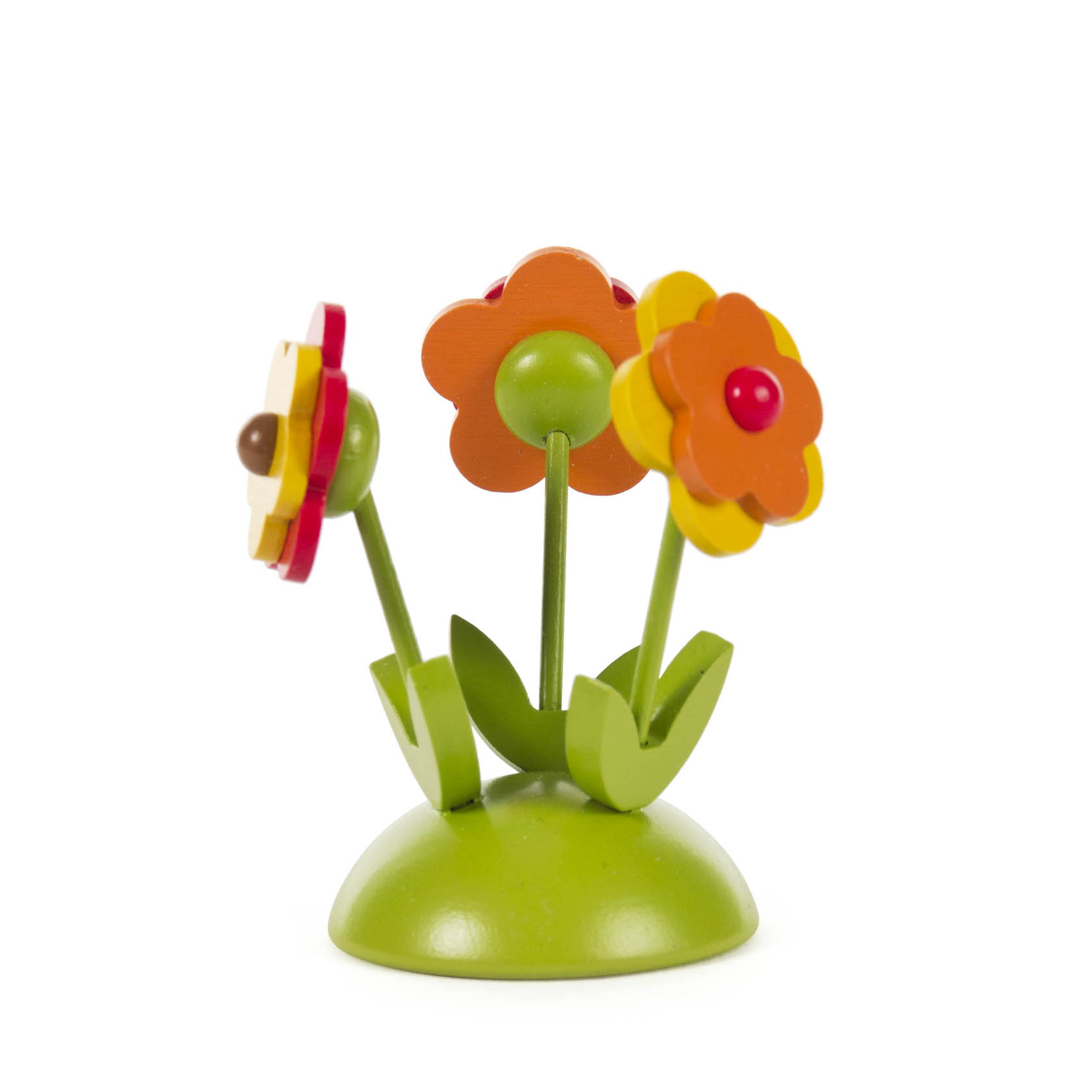 Bunter Blumensockel mit drei farbigen Blumen, die auf grünen Stängeln in einem leuchtend grünen Sockel befestigt sind. im Dregeno Online Shop günstig kaufen