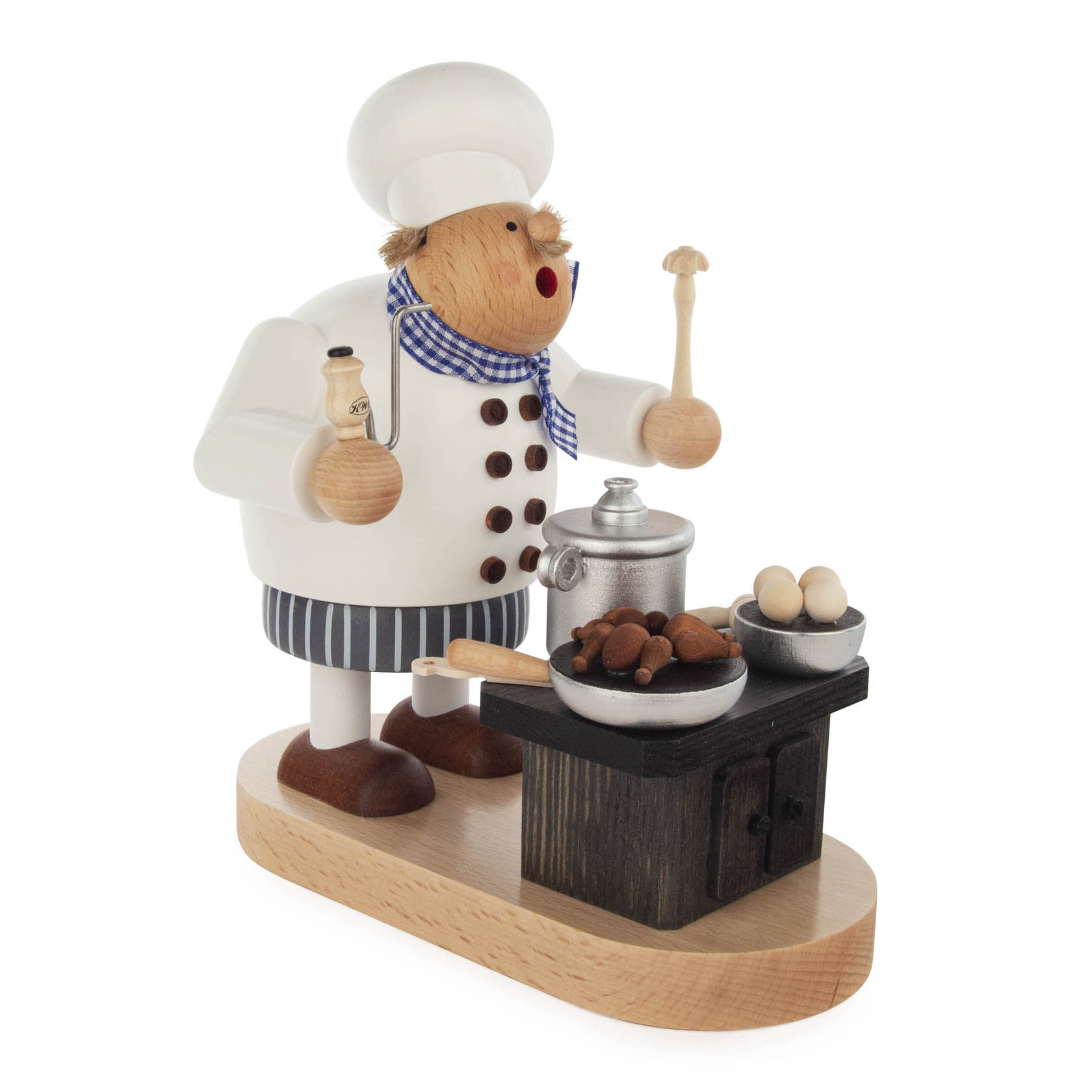 Holzfigur eines Kochs mit weißer Kochmütze und kariertem Tuch, die einen Kochlöffel in einer Hand hält und neben einem Herd mit Töpfen steht. im Dregeno Online Shop günstig kaufen