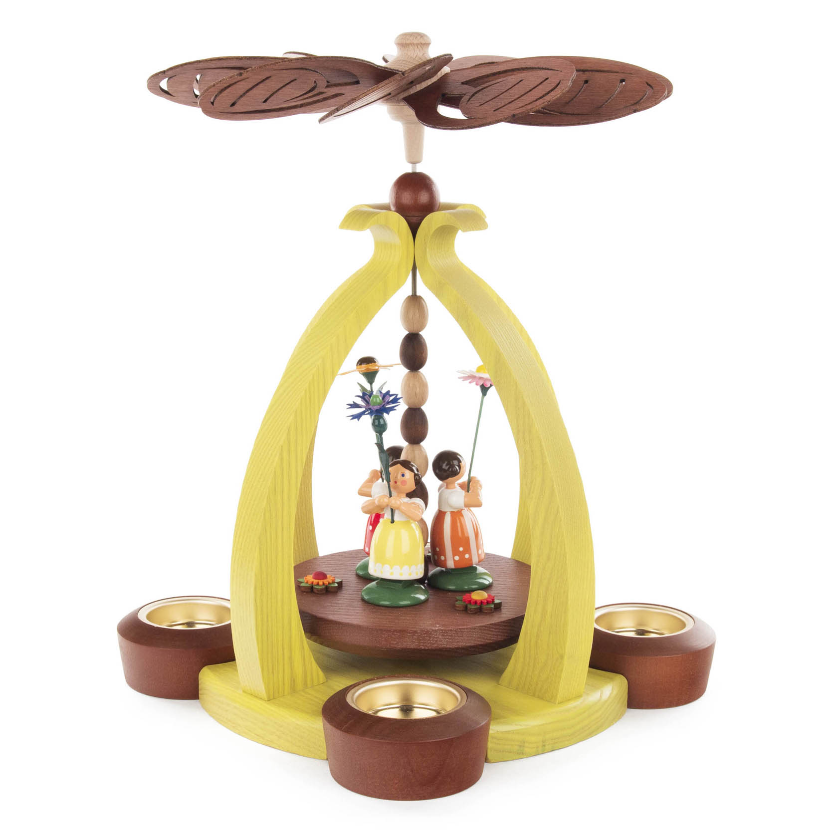 Holzpyramide mit drei gelben Bögen, darauf ein Holzpropeller. Im Inneren zwei handbemalte Blumenkinder aus Holz. Vier Teelichthalter an der Basis. im Dregeno Online Shop günstig kaufen