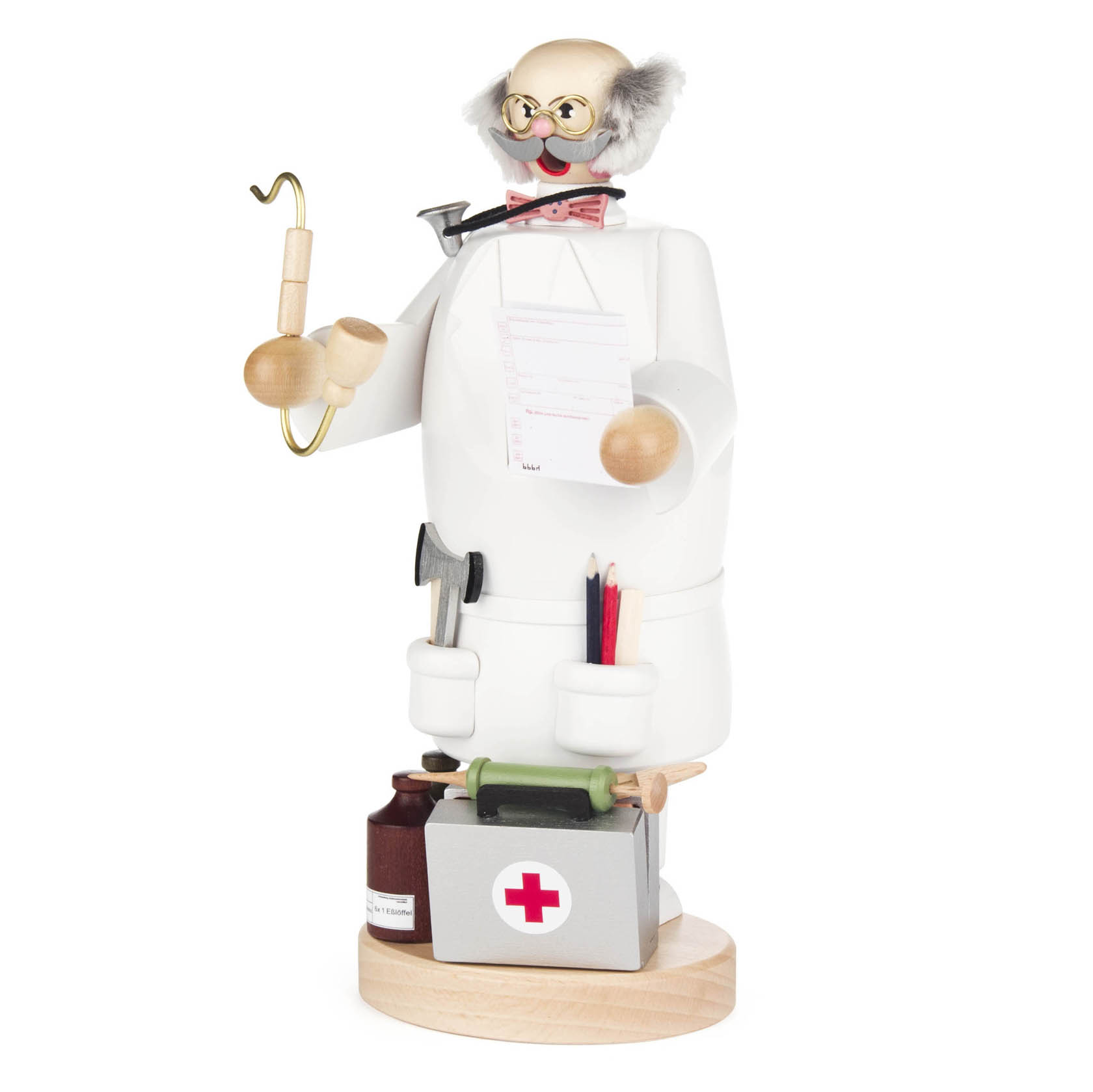 Ein Räuchermann in der Gestalt eines Arztes mit Brille und Schnurrbart. Er trägt einen weißen Kittel, hält ein Rezept in einer Hand und ein Stethoskop in der anderen. im Dregeno Online Shop günstig kaufen